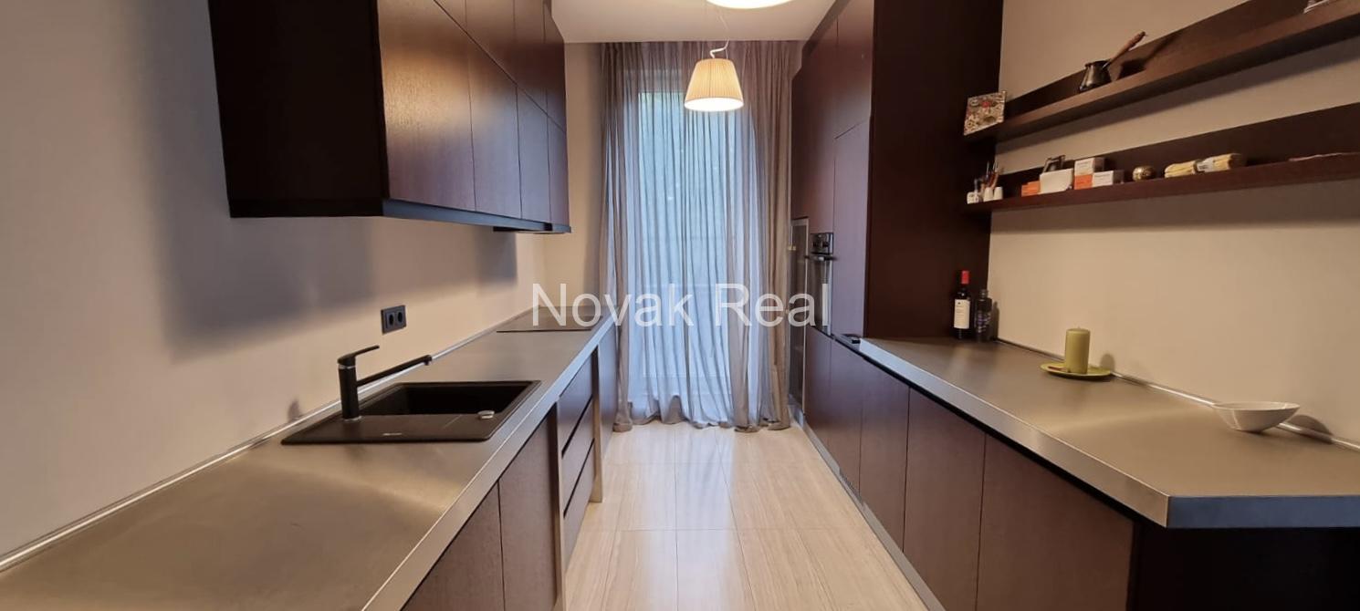 A cozy 4-room apartment with a lovely terrace overlooking a river is for rent
