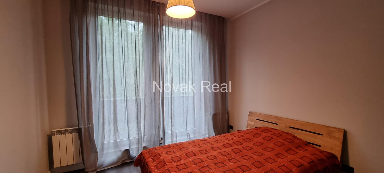 A cozy 4-room apartment with a lovely terrace overlooking a river is for rent