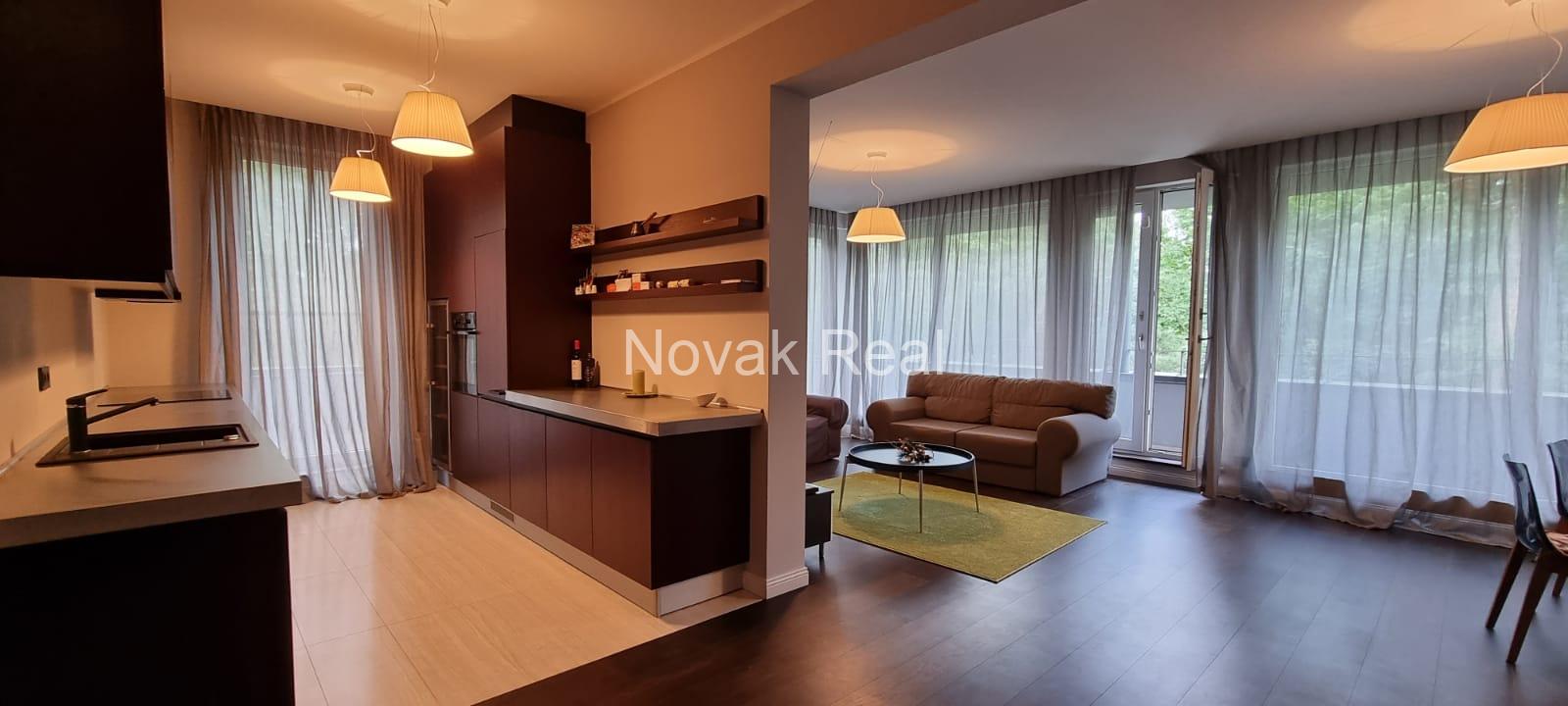 A cozy 4-room apartment with a lovely terrace overlooking a river is for rent
