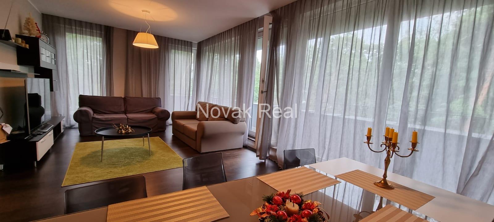 A cozy 4-room apartment with a lovely terrace overlooking a river is for rent