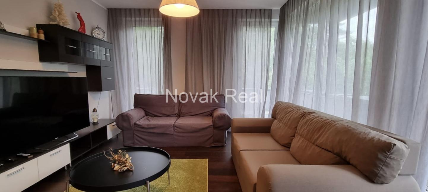 A cozy 4-room apartment with a lovely terrace overlooking a river is for rent