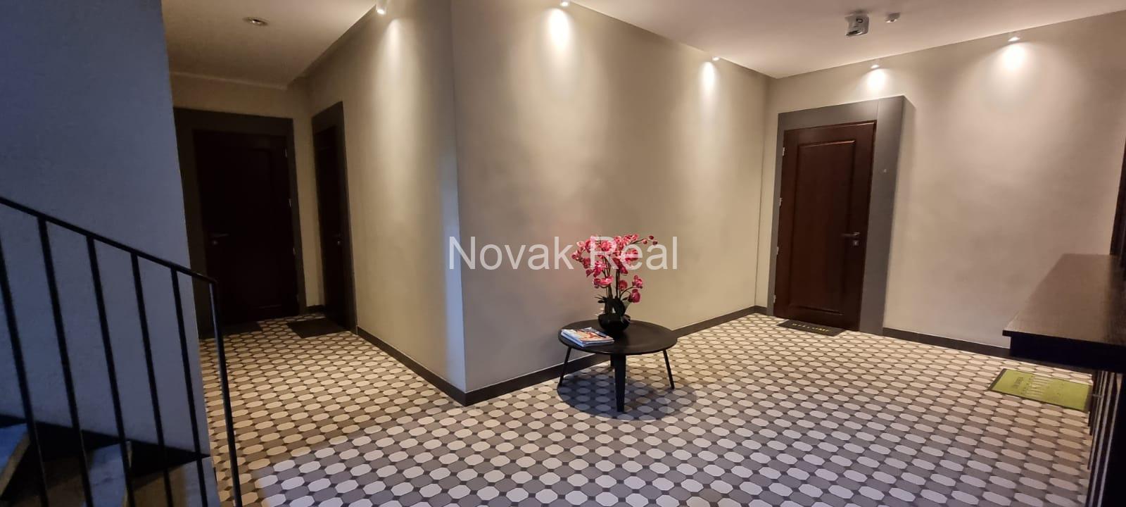 A cozy 4-room apartment with a lovely terrace overlooking a river is for rent