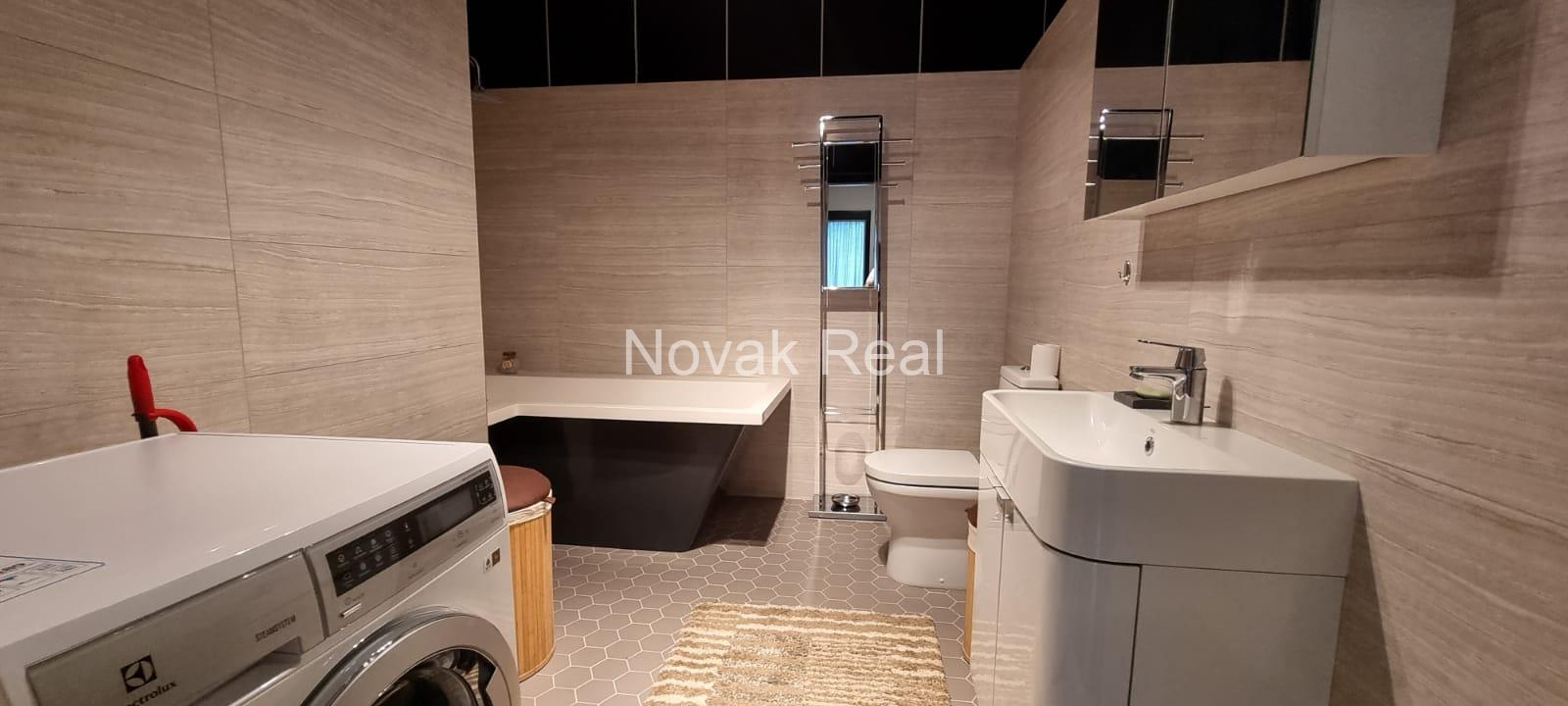 A cozy 4-room apartment with a lovely terrace overlooking a river is for rent