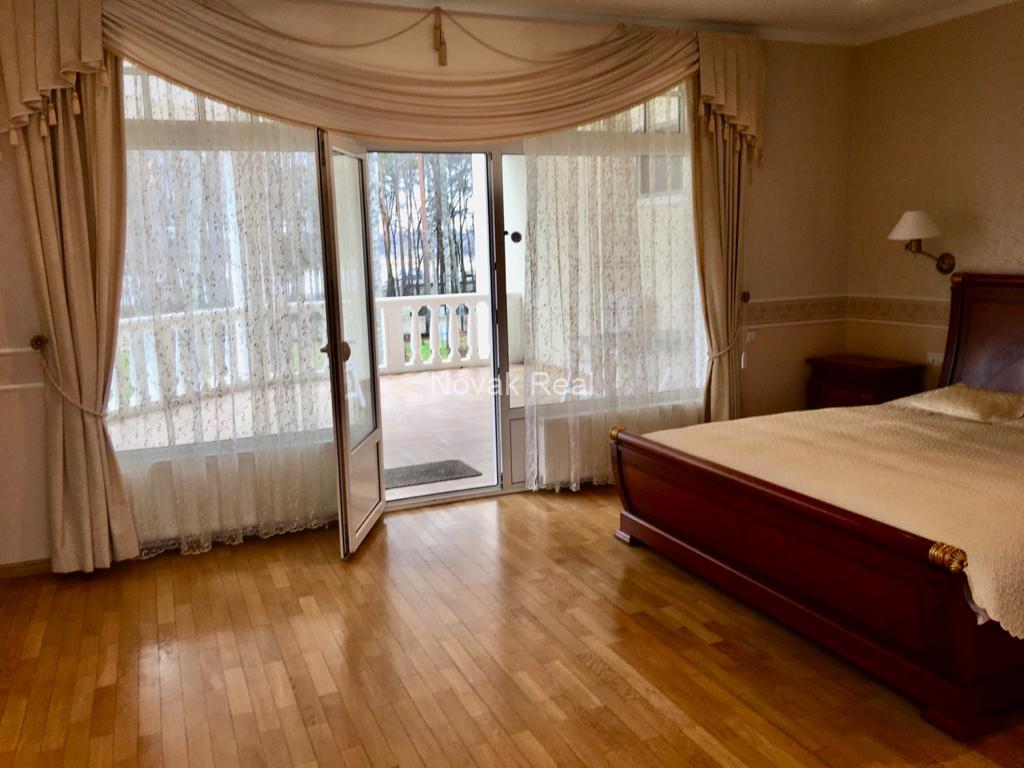 A house for sale in a quiet part of Jūrmala, near the yacht club, offering beautiful views of the river
