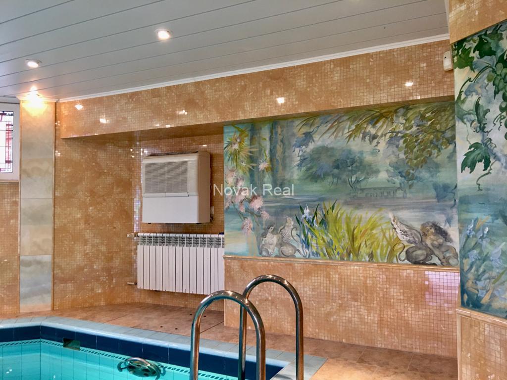 A house for sale in a quiet part of Jūrmala, near the yacht club, offering beautiful views of the river