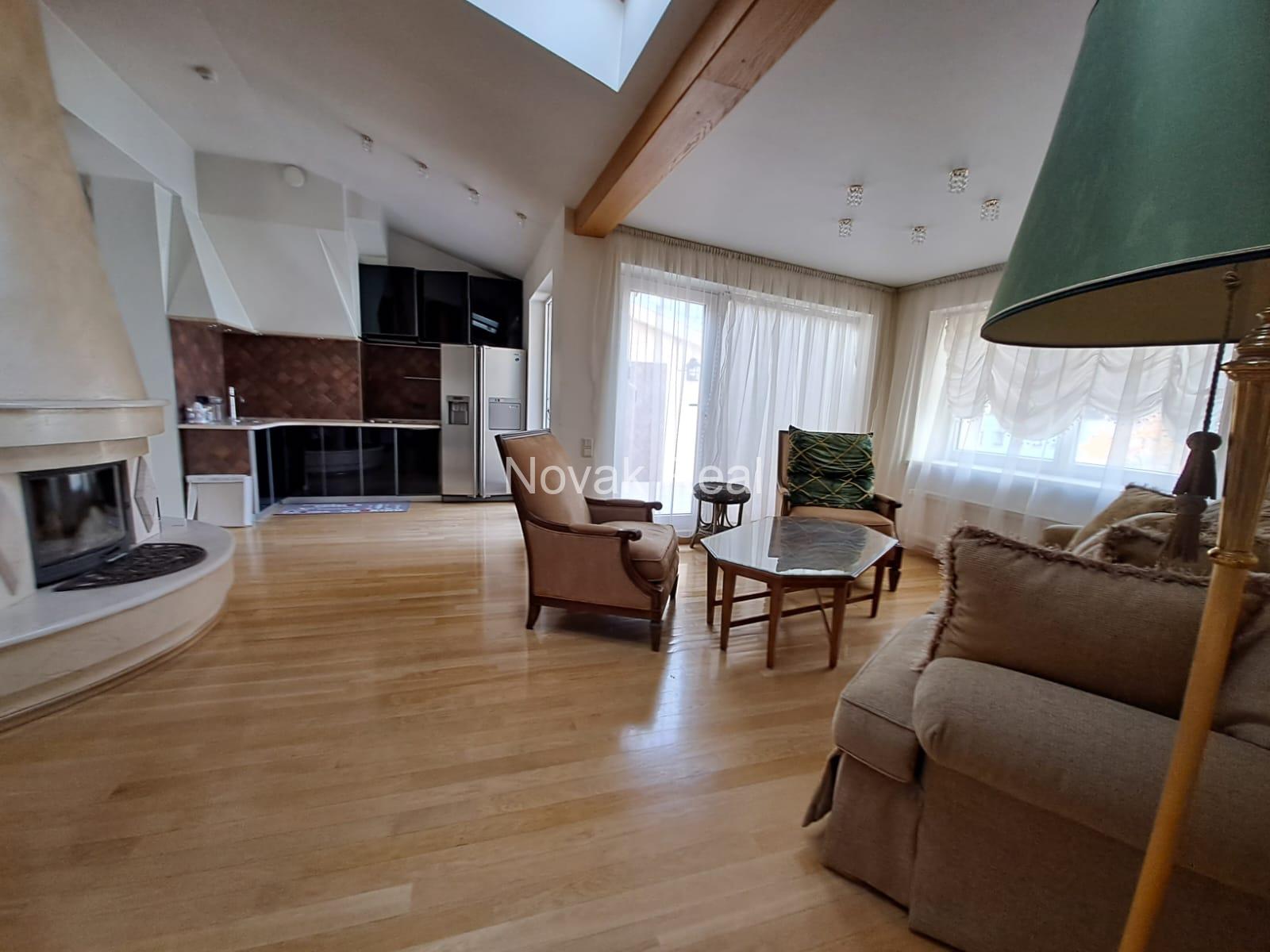 A cozy apartment with a terrace is available for rent in a beautiful building after full renovation