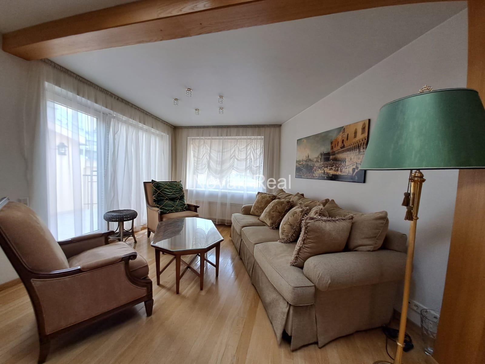 A cozy apartment with a terrace is available for rent in a beautiful building after full renovation