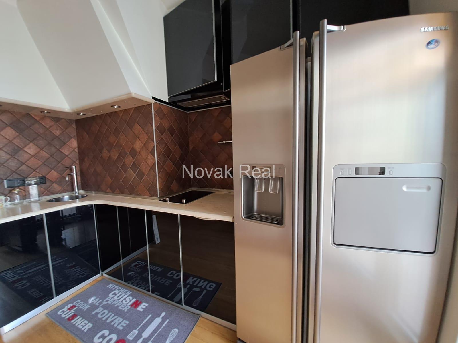 A cozy apartment with a terrace is available for rent in a beautiful building after full renovation