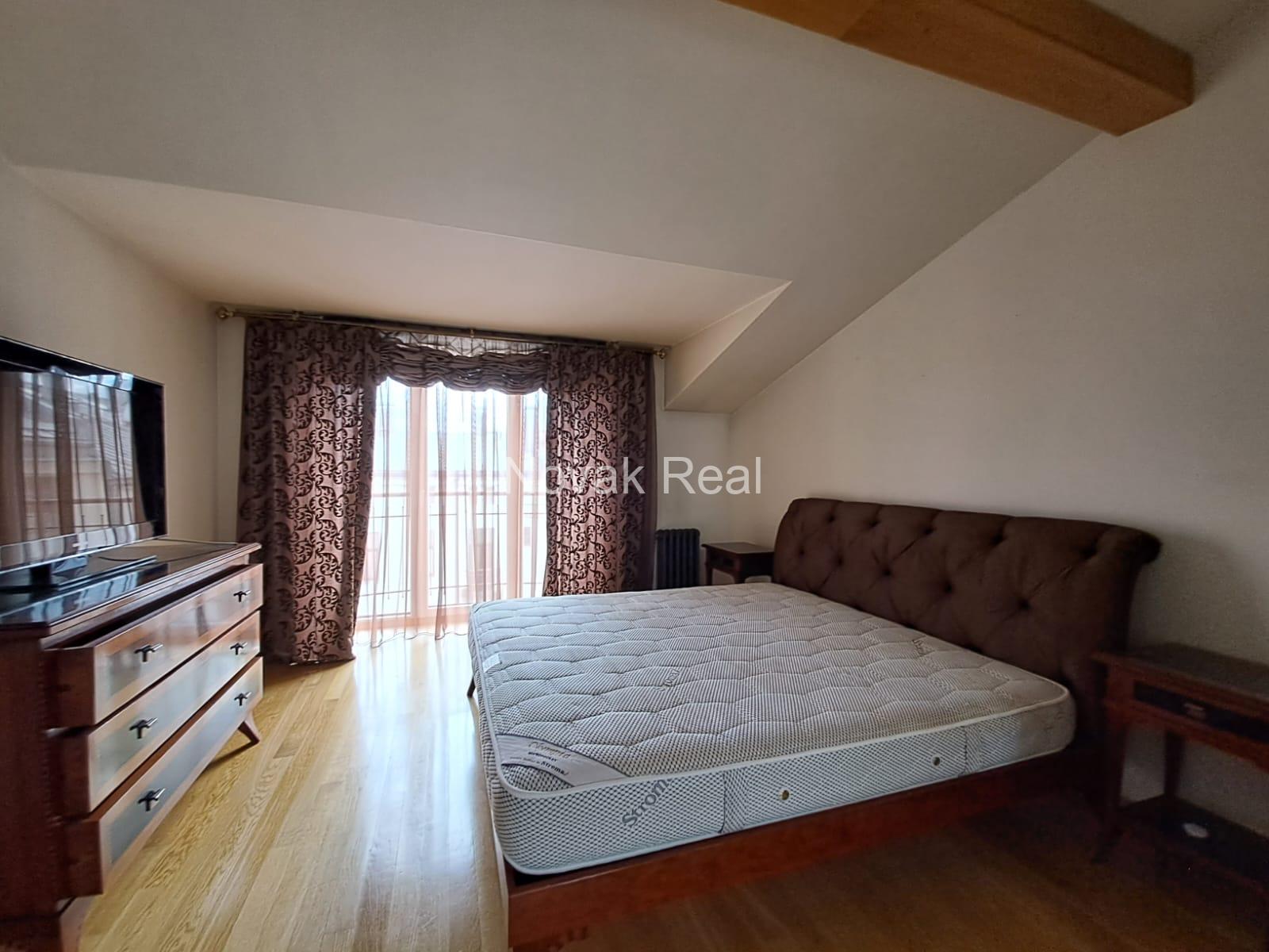 A cozy apartment with a terrace is available for rent in a beautiful building after full renovation