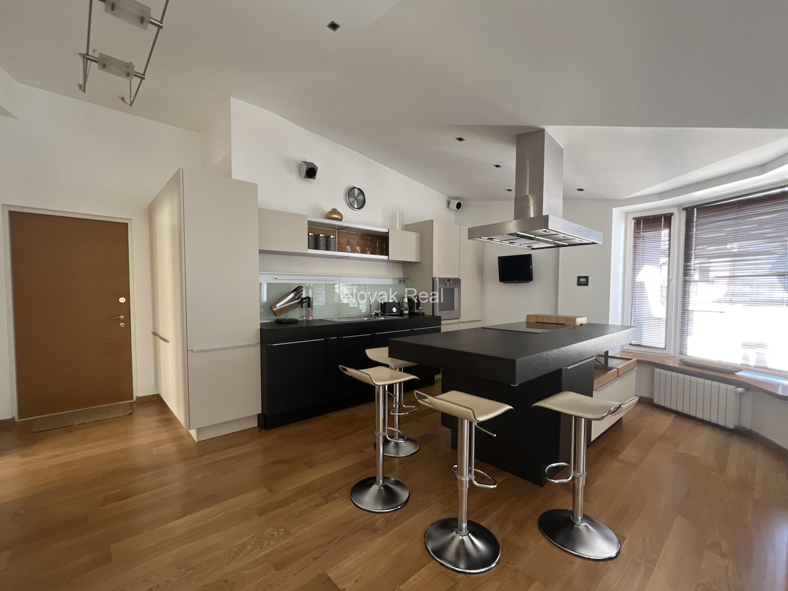 A designer apartment in a clubhouse is for rent in the quiet city centre