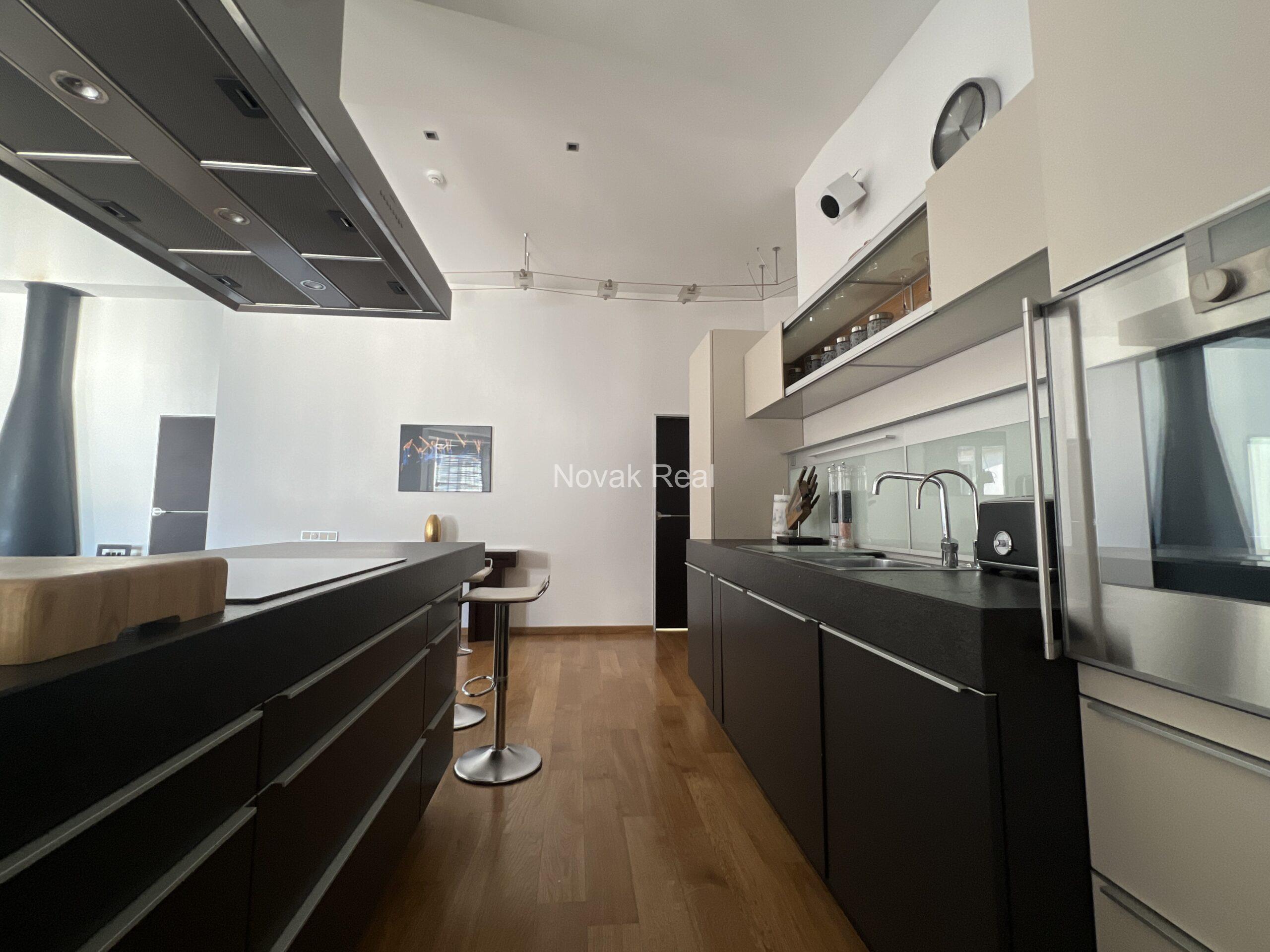 A designer apartment in a clubhouse is for rent in the quiet city centre