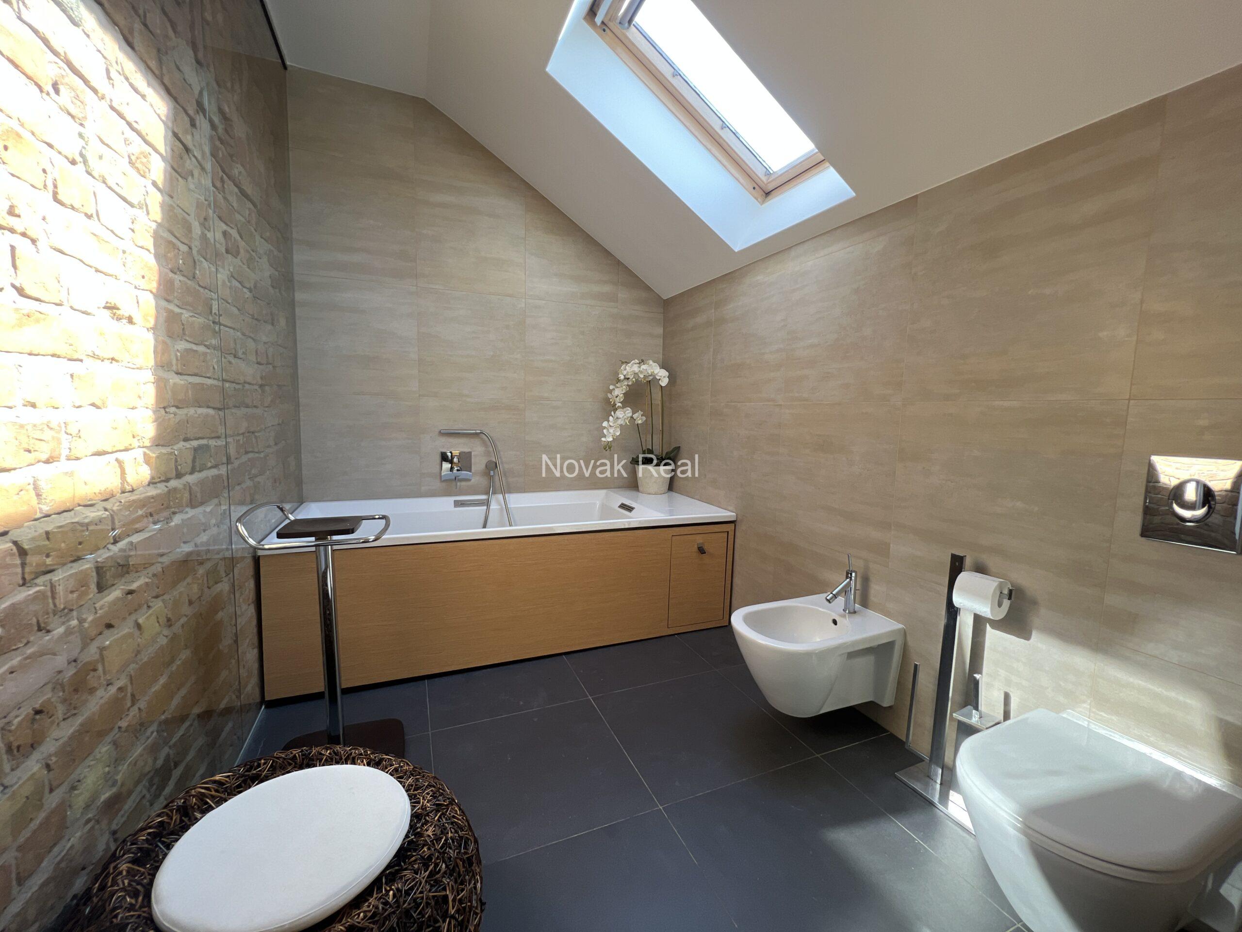 A designer apartment in a clubhouse is for rent in the quiet city centre