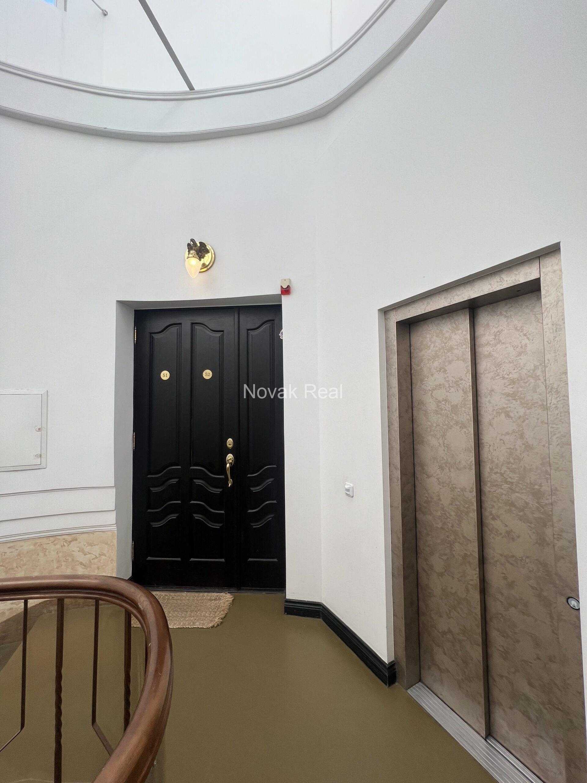 A designer apartment in a clubhouse is for rent in the quiet city centre