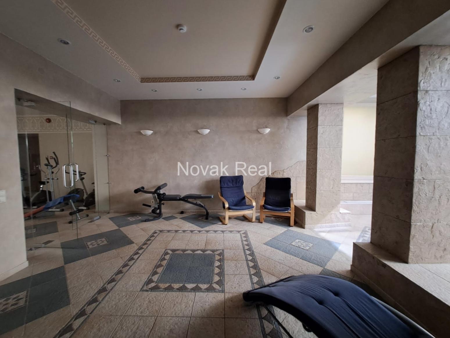 A designer apartment in a clubhouse is for rent in the quiet city centre