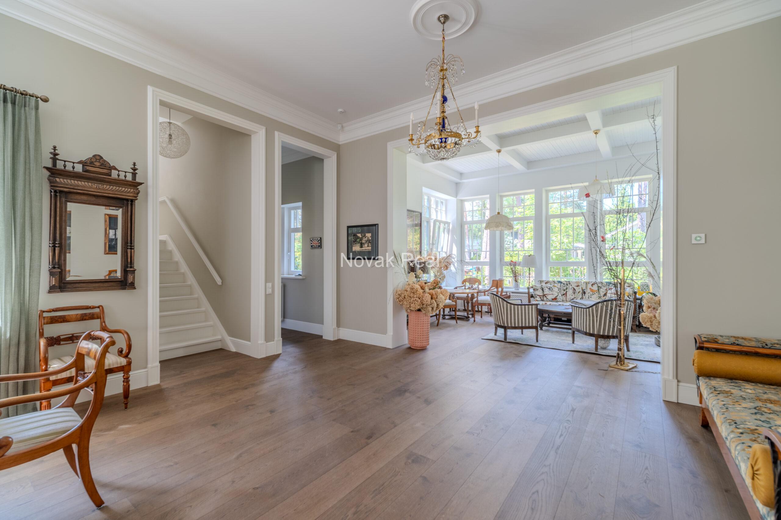 An elegant newly built villa is offered for sale in Jurmala, Lielupe, located near the sea and Ragakāpa Nature Park