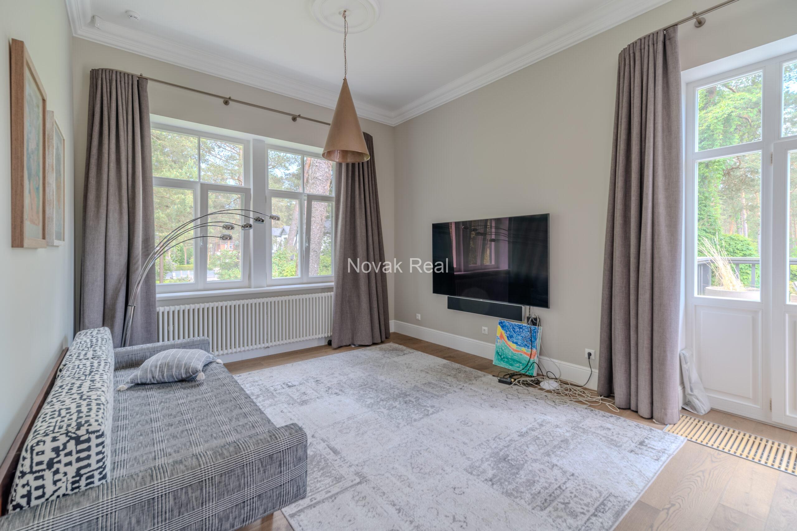 An elegant newly built villa is offered for sale in Jurmala, Lielupe, located near the sea and Ragakāpa Nature Park