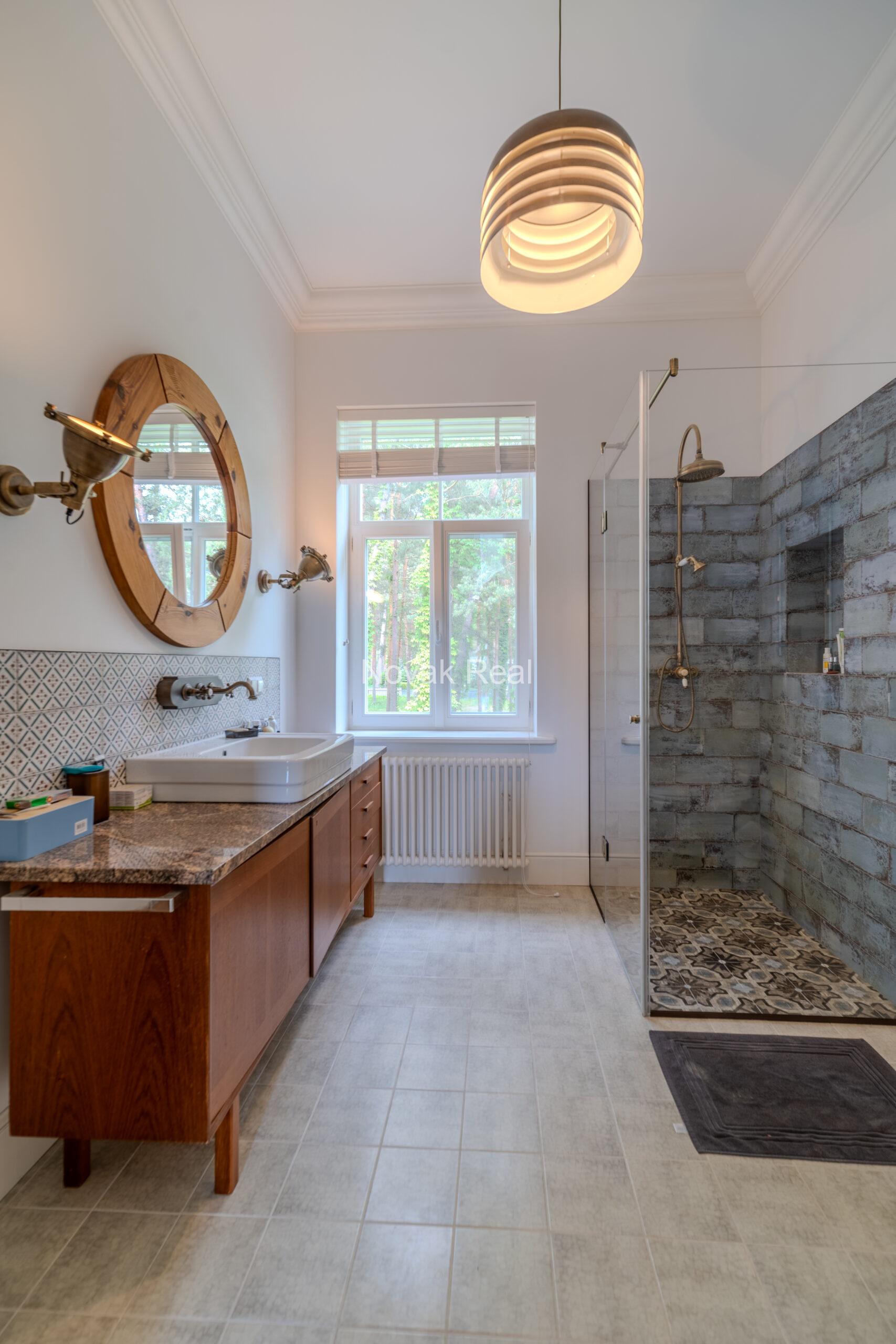 An elegant newly built villa is offered for sale in Jurmala, Lielupe, located near the sea and Ragakāpa Nature Park
