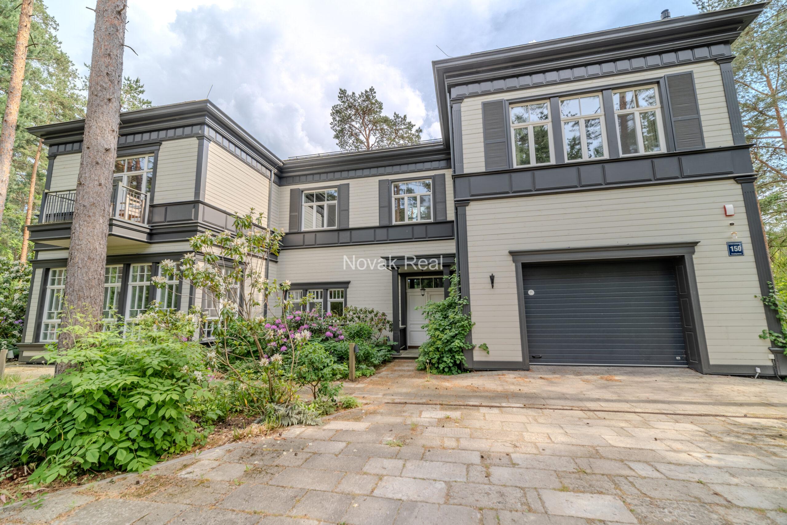 An elegant newly built villa is offered for sale in Jurmala, Lielupe, located near the sea and Ragakāpa Nature Park