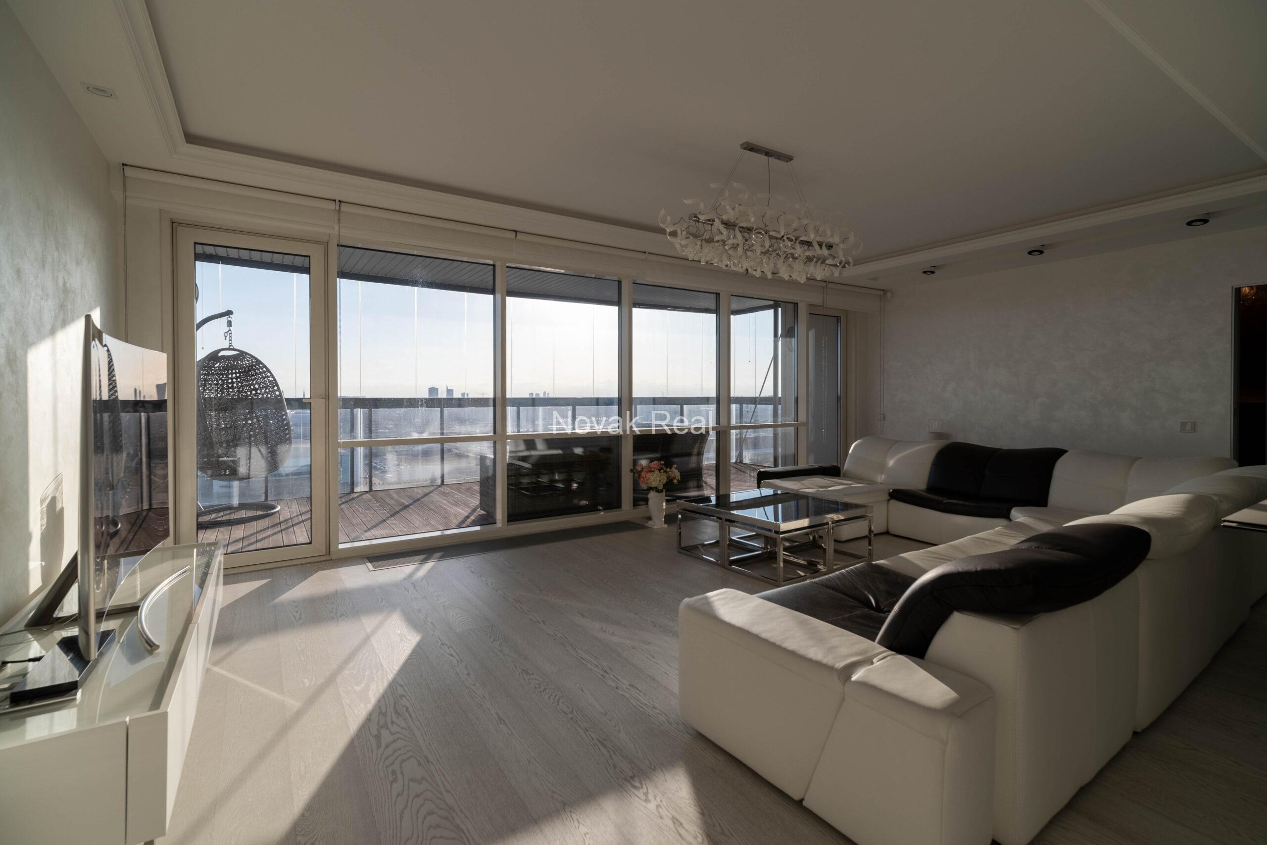 In the center of Riga, in the new modern project “Skanstes virsotnes” a designer sunny apartment is for rent