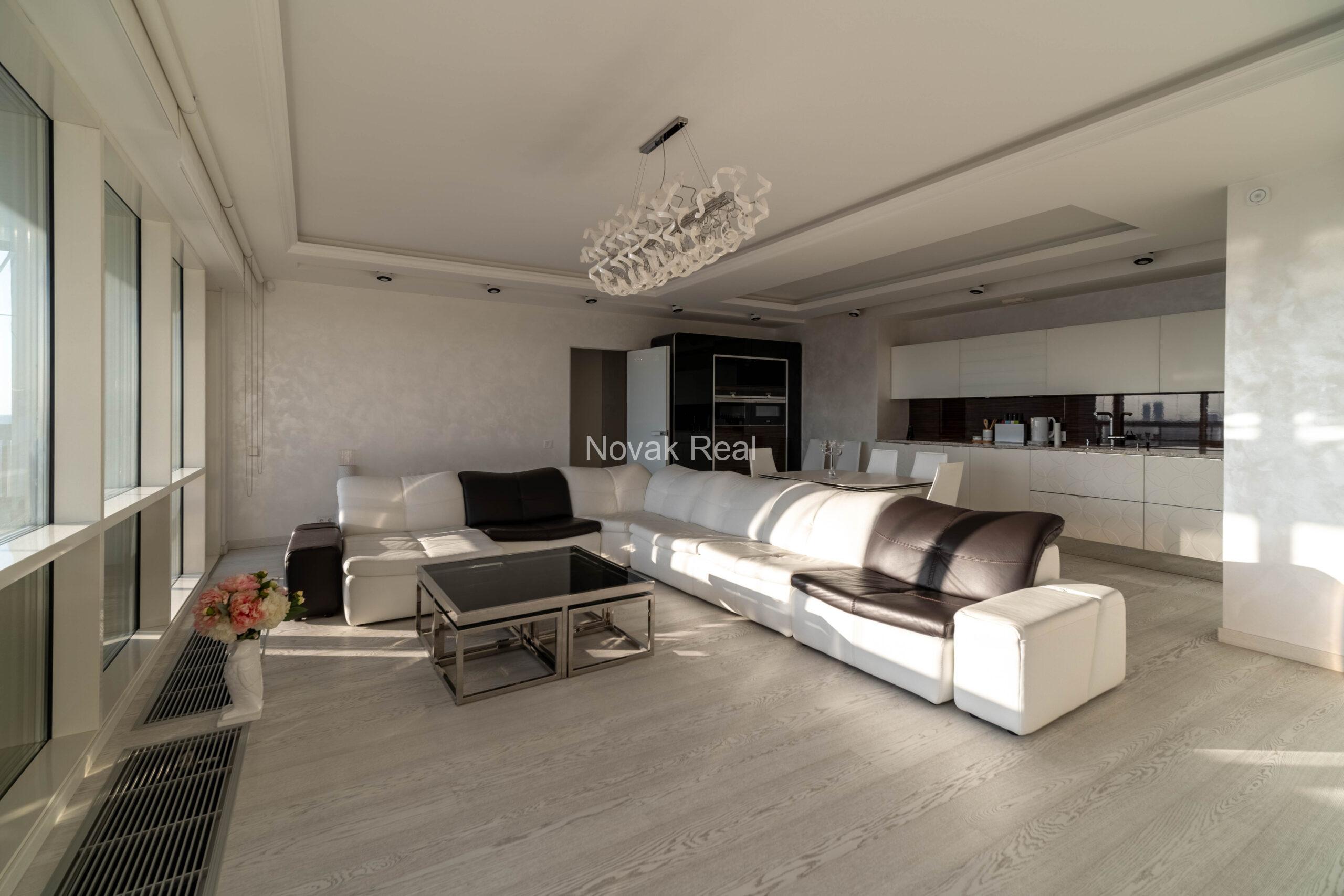 In the center of Riga, in the new modern project “Skanstes virsotnes” a designer sunny apartment is for rent
