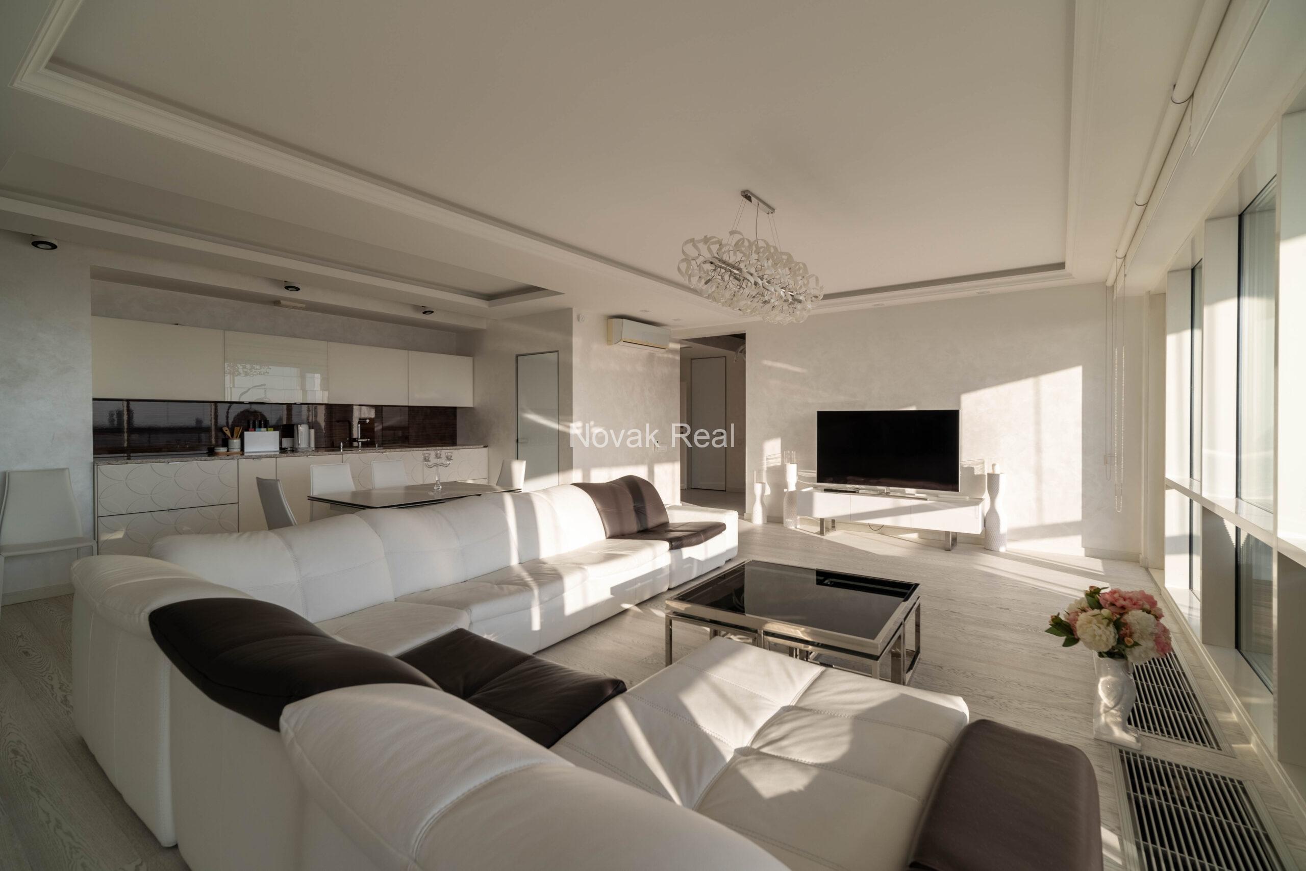 In the center of Riga, in the new modern project “Skanstes virsotnes” a designer sunny apartment is for rent