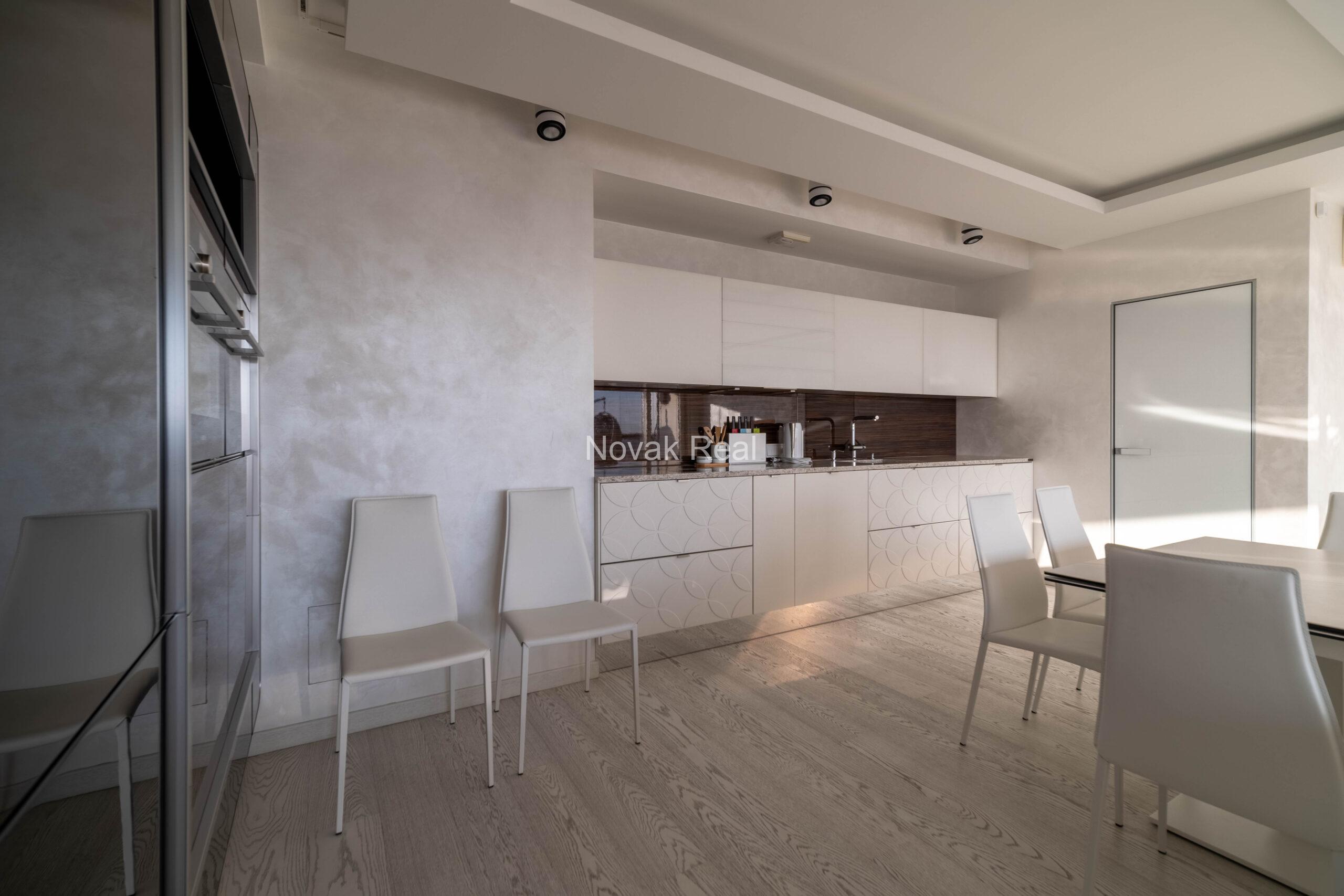 In the center of Riga, in the new modern project “Skanstes virsotnes” a designer sunny apartment is for rent