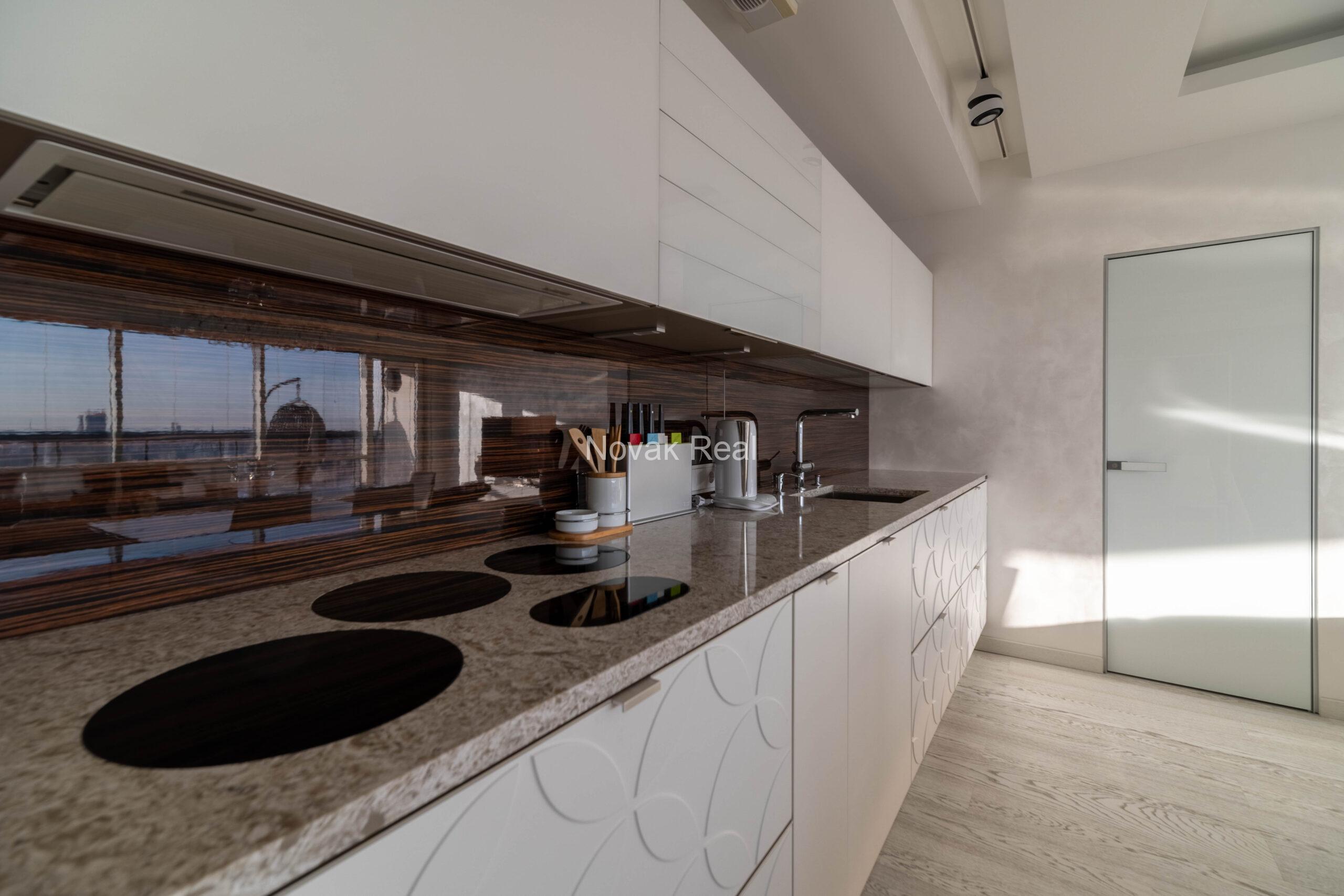 In the center of Riga, in the new modern project “Skanstes virsotnes” a designer sunny apartment is for rent