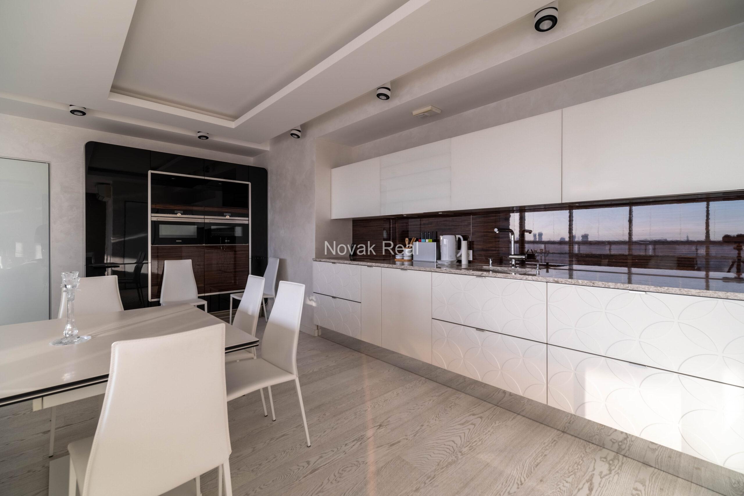 In the center of Riga, in the new modern project “Skanstes virsotnes” a designer sunny apartment is for rent