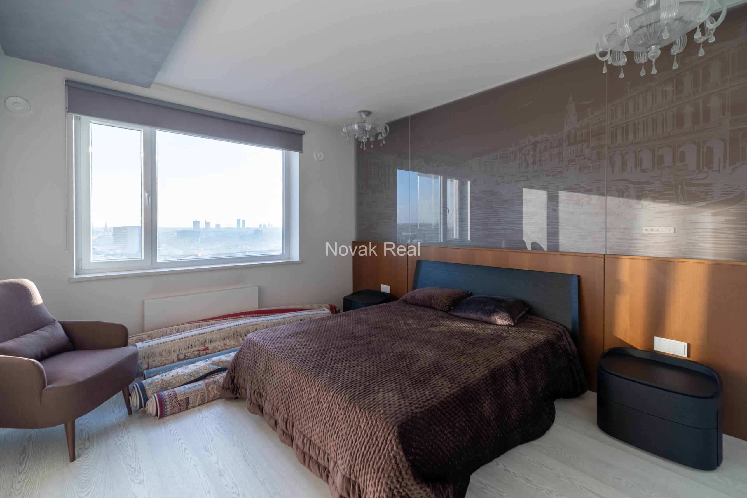 In the center of Riga, in the new modern project “Skanstes virsotnes” a designer sunny apartment is for rent