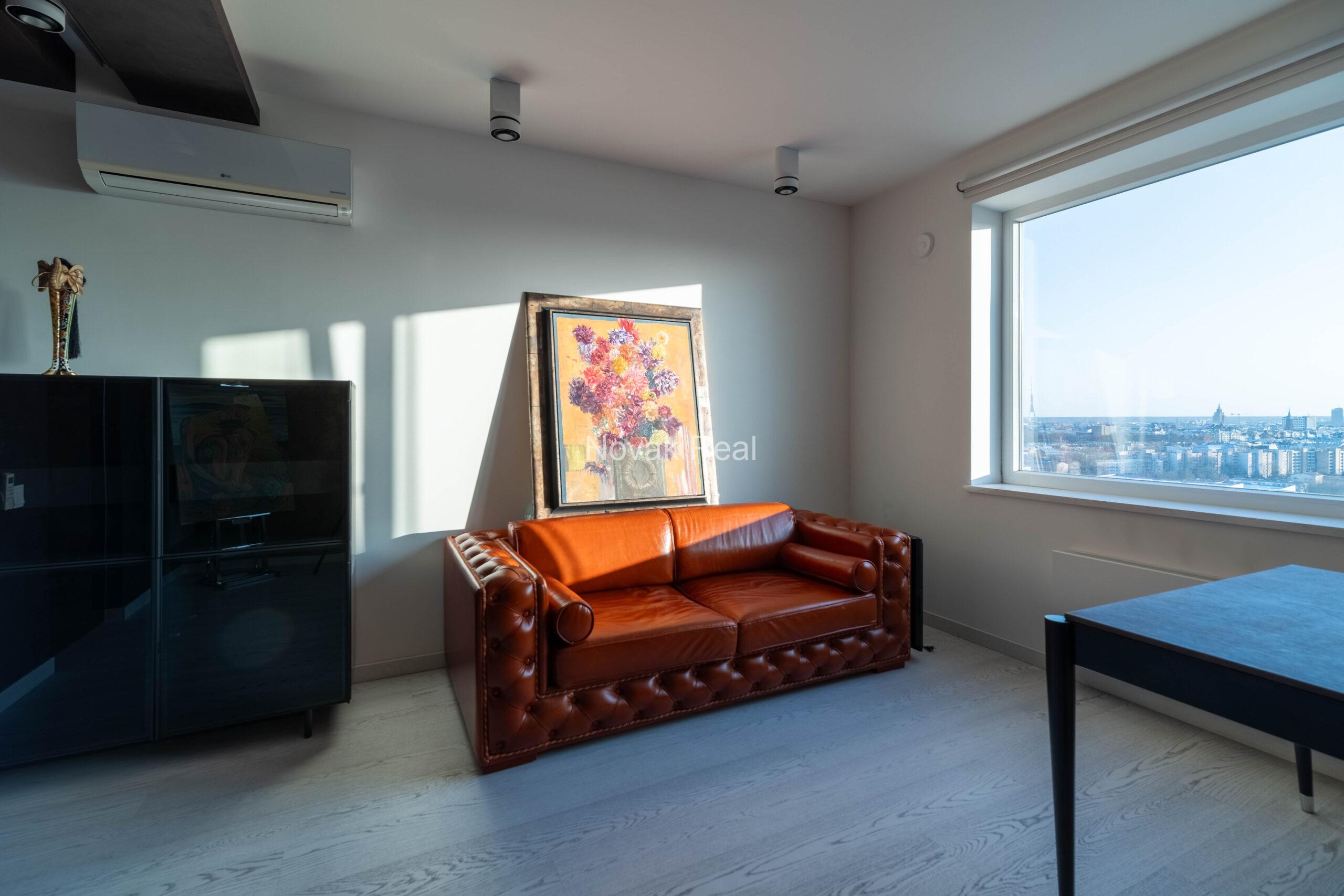 In the center of Riga, in the new modern project “Skanstes virsotnes” a designer sunny apartment is for rent