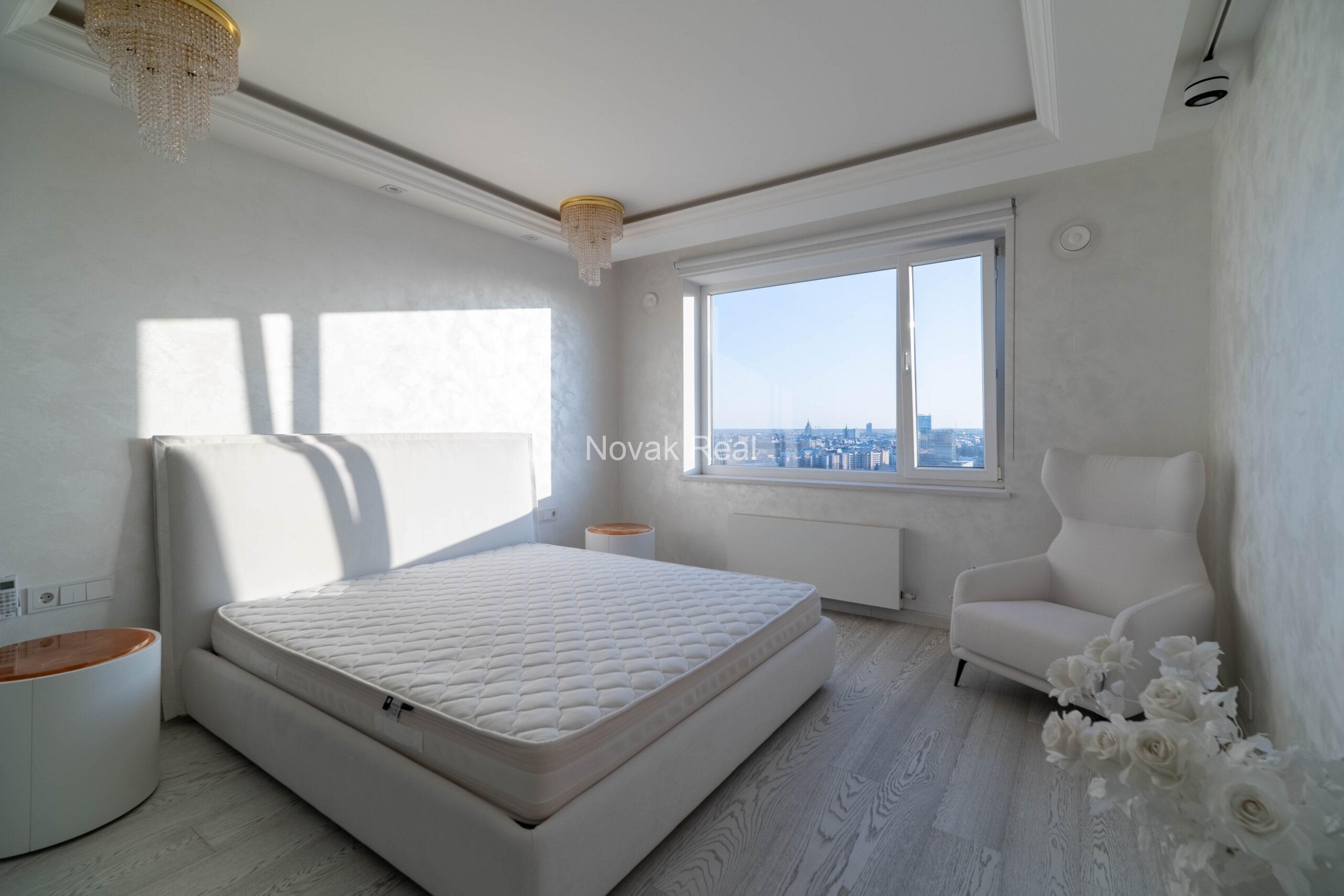 In the center of Riga, in the new modern project “Skanstes virsotnes” a designer sunny apartment is for rent