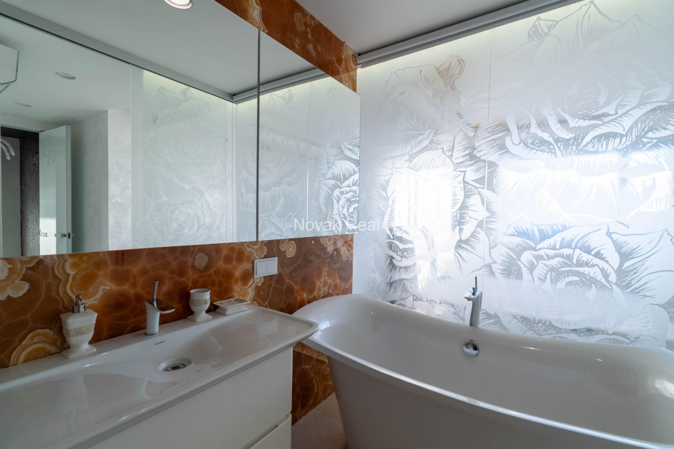 In the center of Riga, in the new modern project “Skanstes virsotnes” a designer sunny apartment is for rent