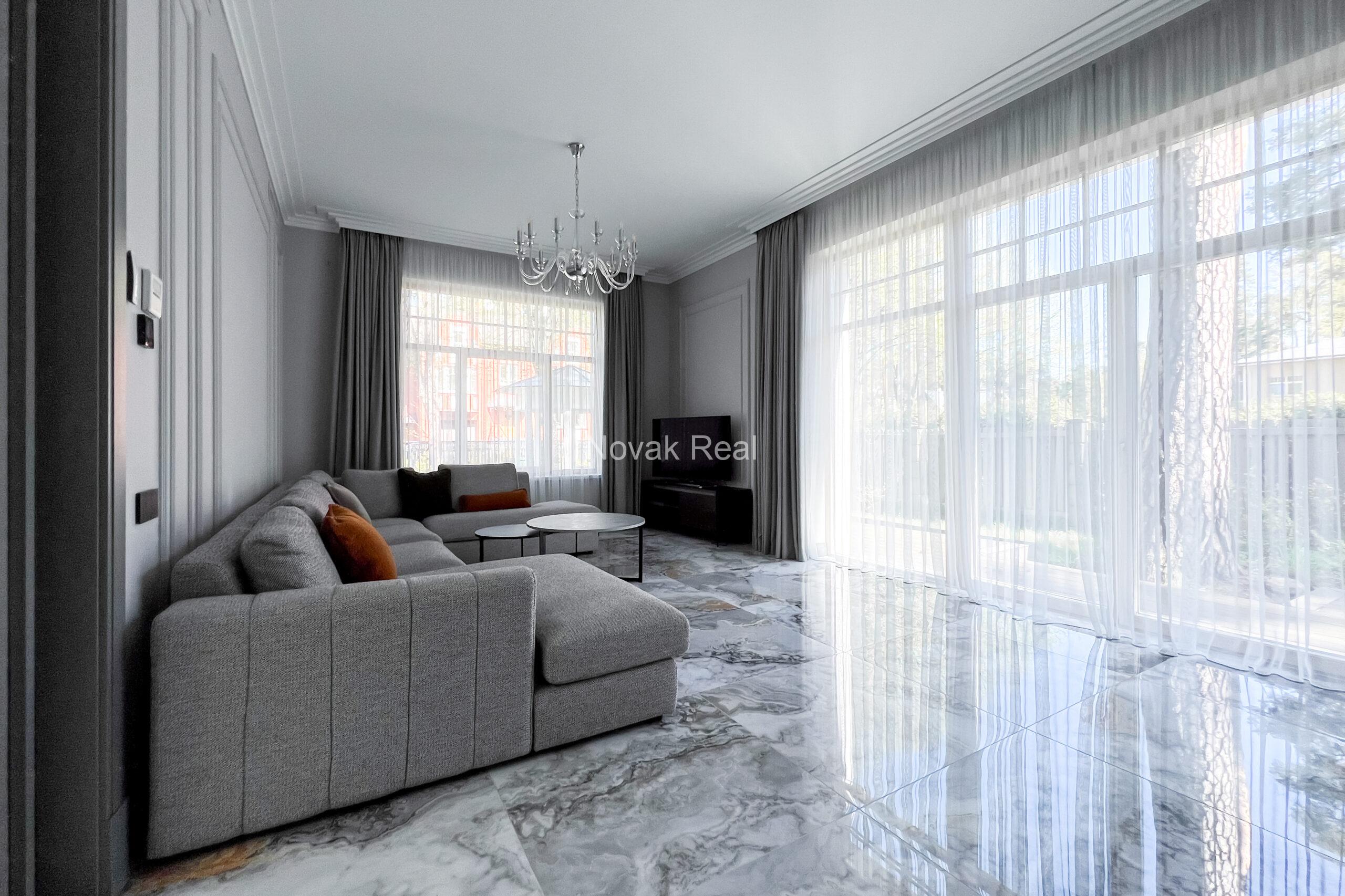 A new five-bedroom house is available for long-term rent in a quiet part of Jūrmala, close to the sea