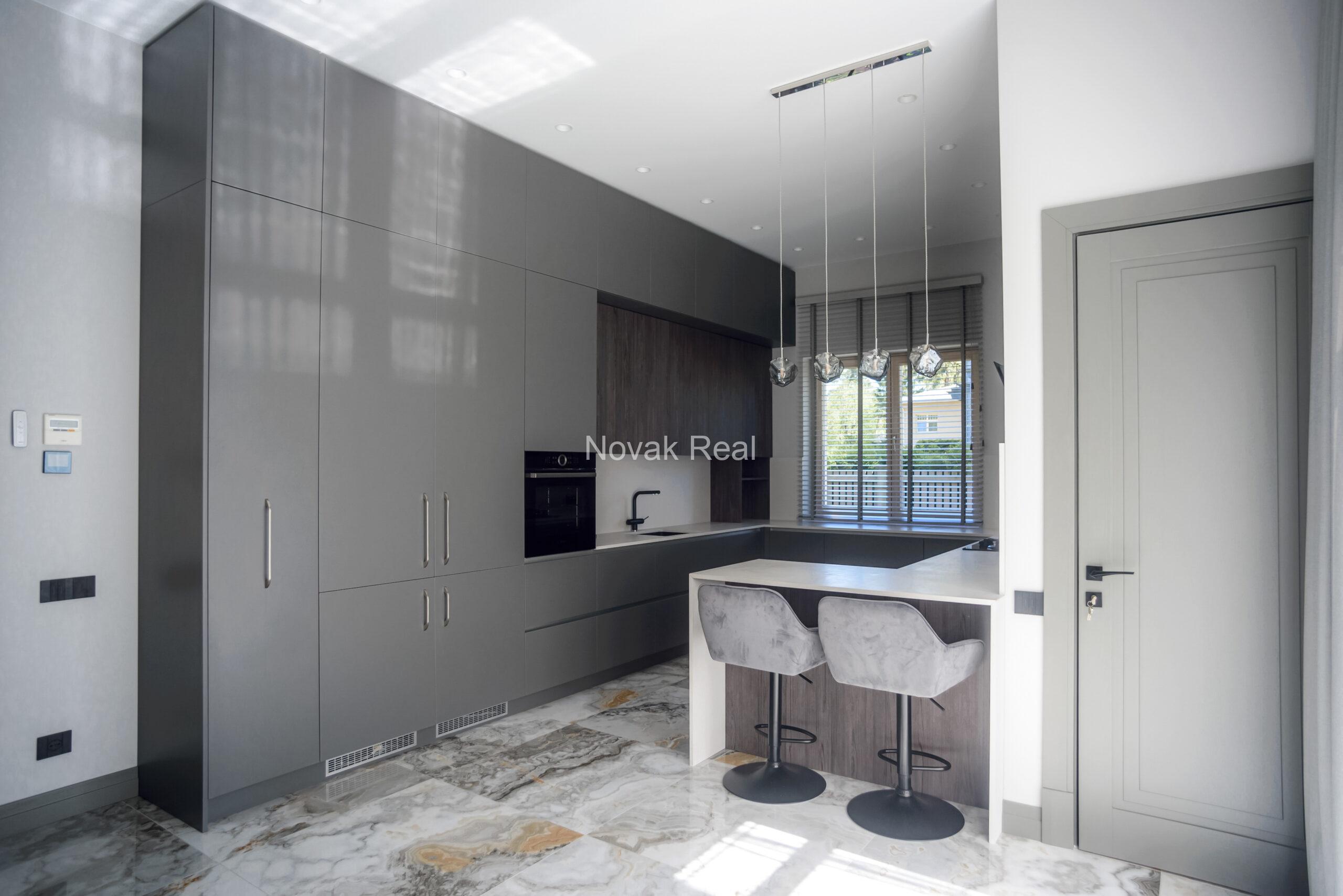 A new five-bedroom house is available for long-term rent in a quiet part of Jūrmala, close to the sea