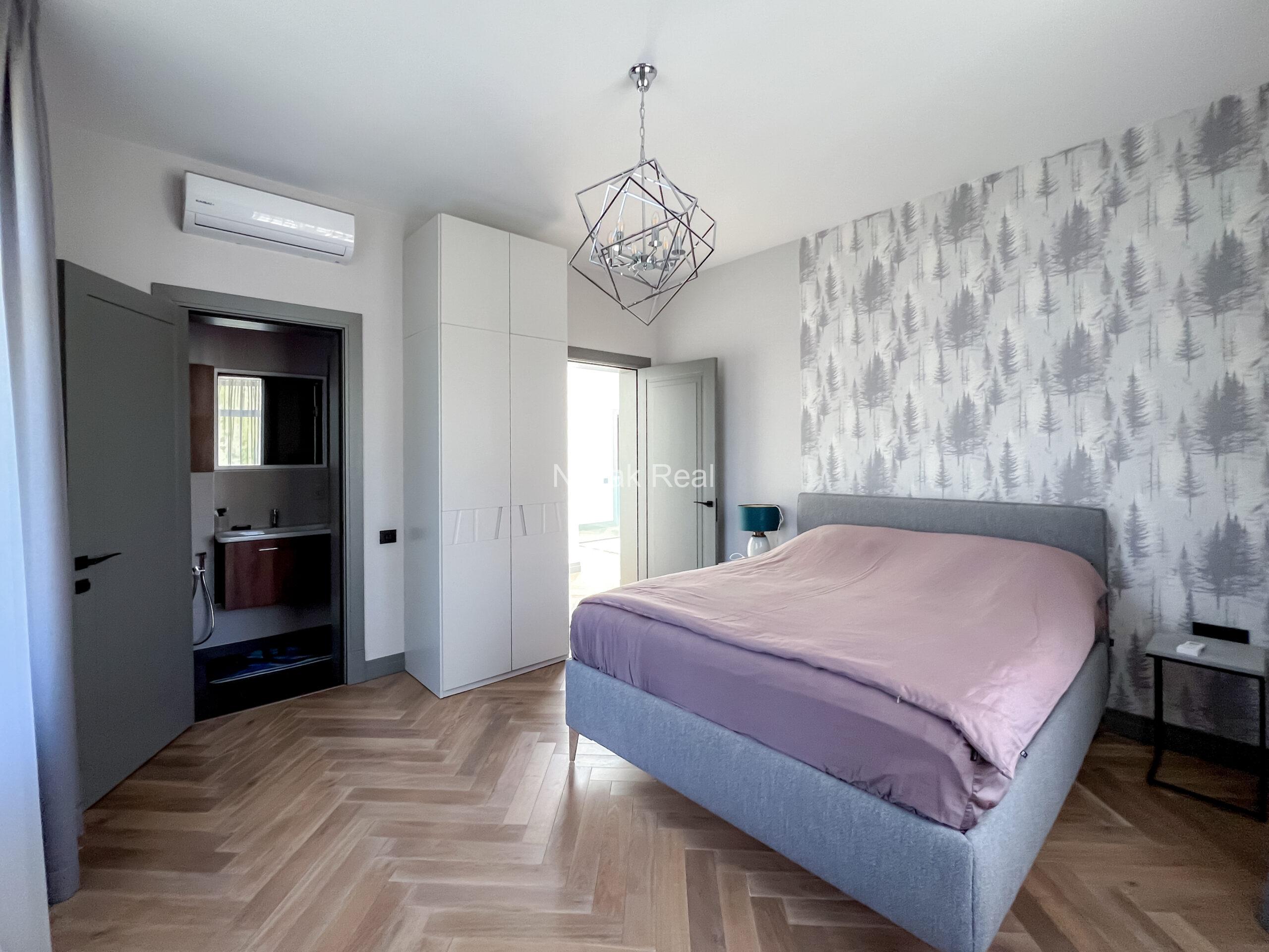 A new five-bedroom house is available for long-term rent in a quiet part of Jūrmala, close to the sea