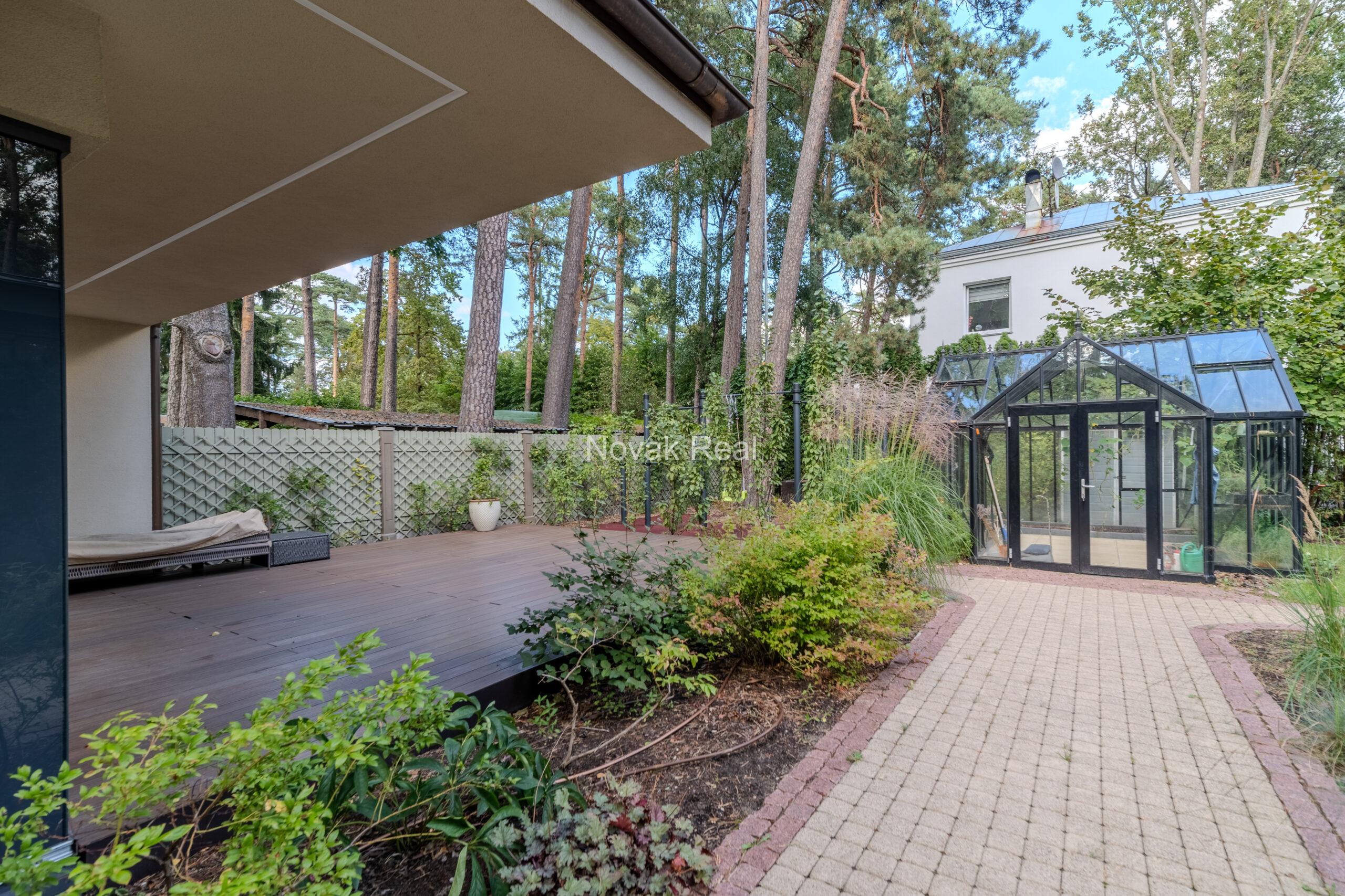 In Lielupe, close to the sea and a pine park, an elegant, renovated three-storey villa is offered for sale