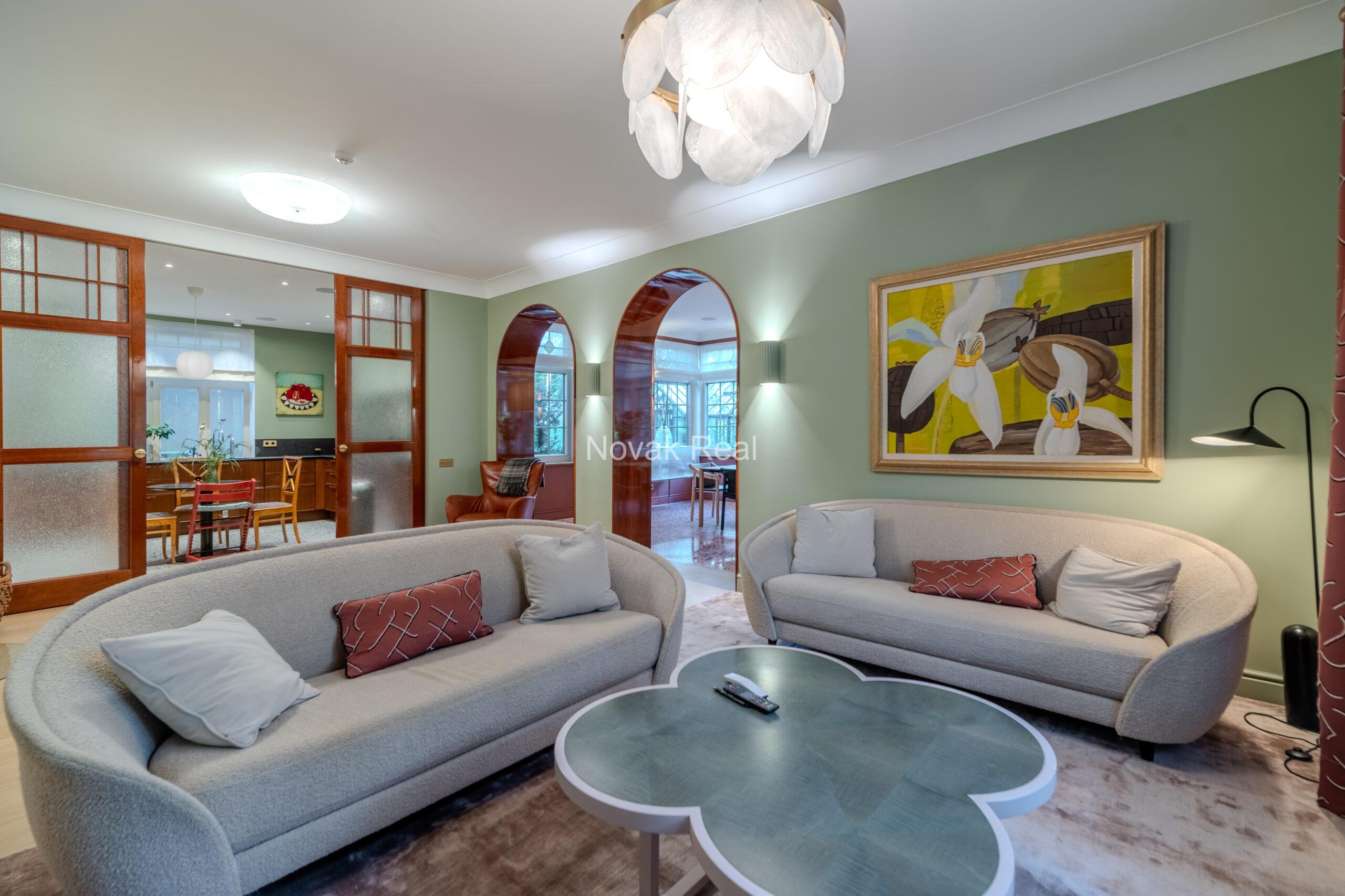 In Lielupe, close to the sea and a pine park, an elegant, renovated three-storey villa is offered for sale