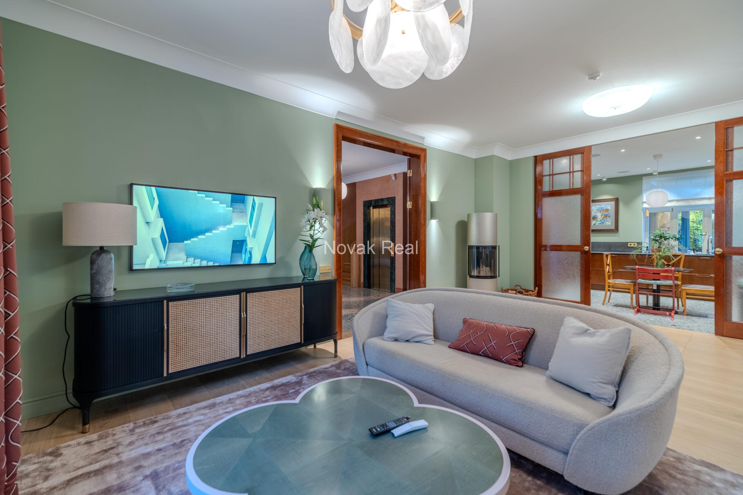 In Lielupe, close to the sea and a pine park, an elegant, renovated three-storey villa is offered for sale