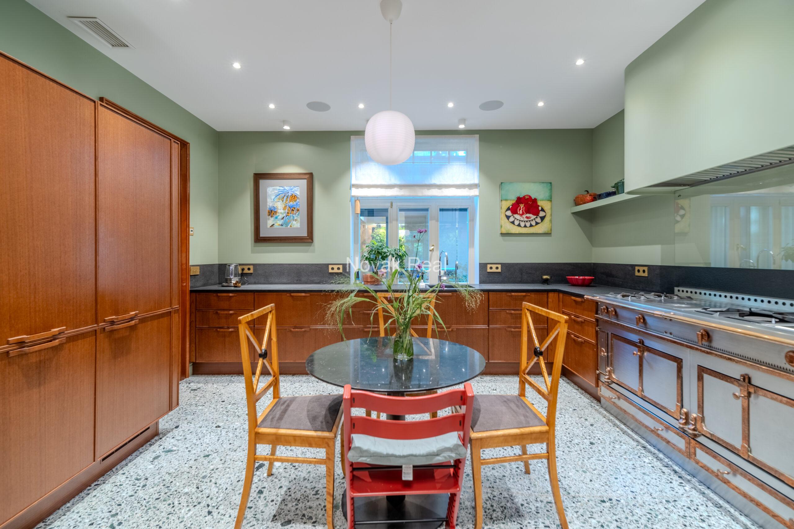 In Lielupe, close to the sea and a pine park, an elegant, renovated three-storey villa is offered for sale