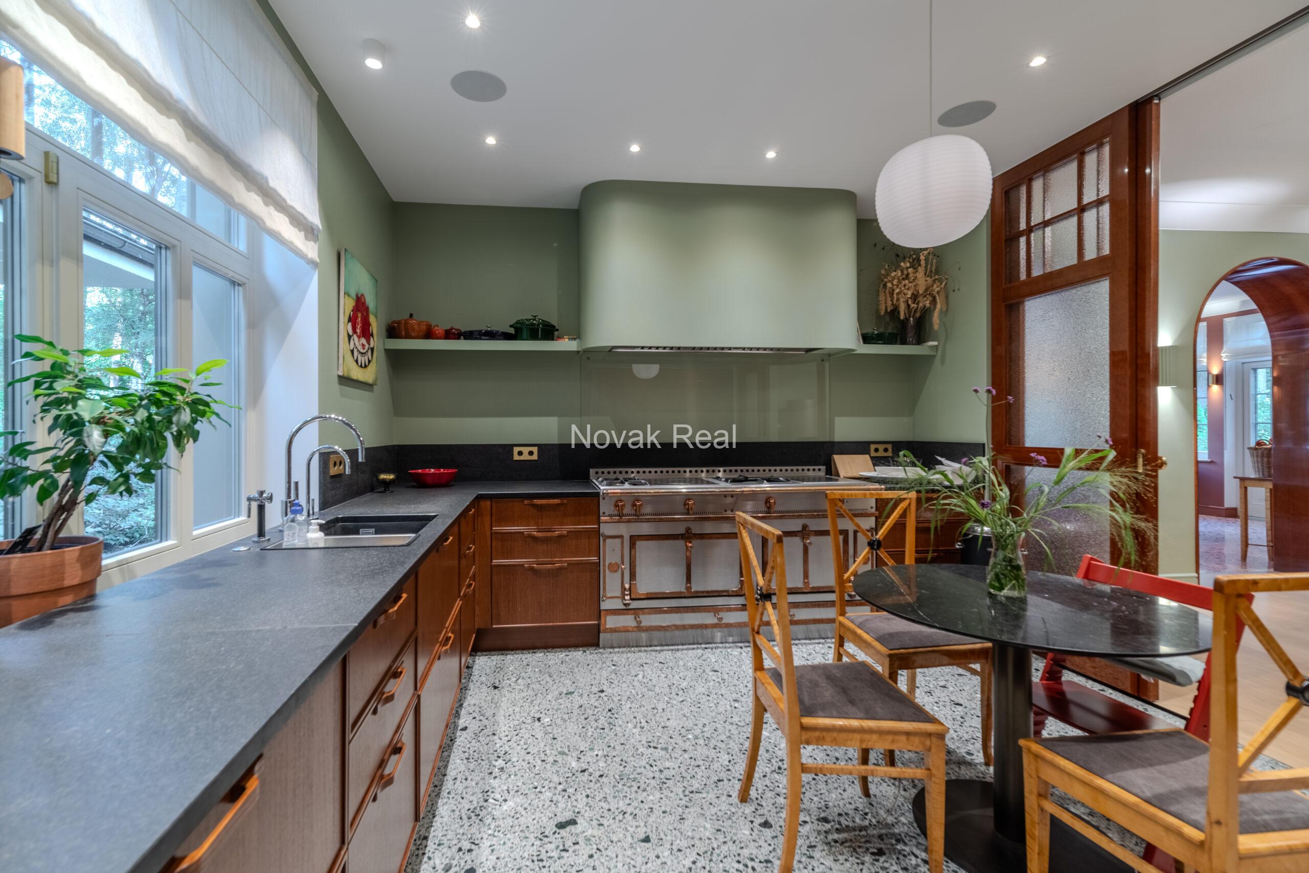 In Lielupe, close to the sea and a pine park, an elegant, renovated three-storey villa is offered for sale
