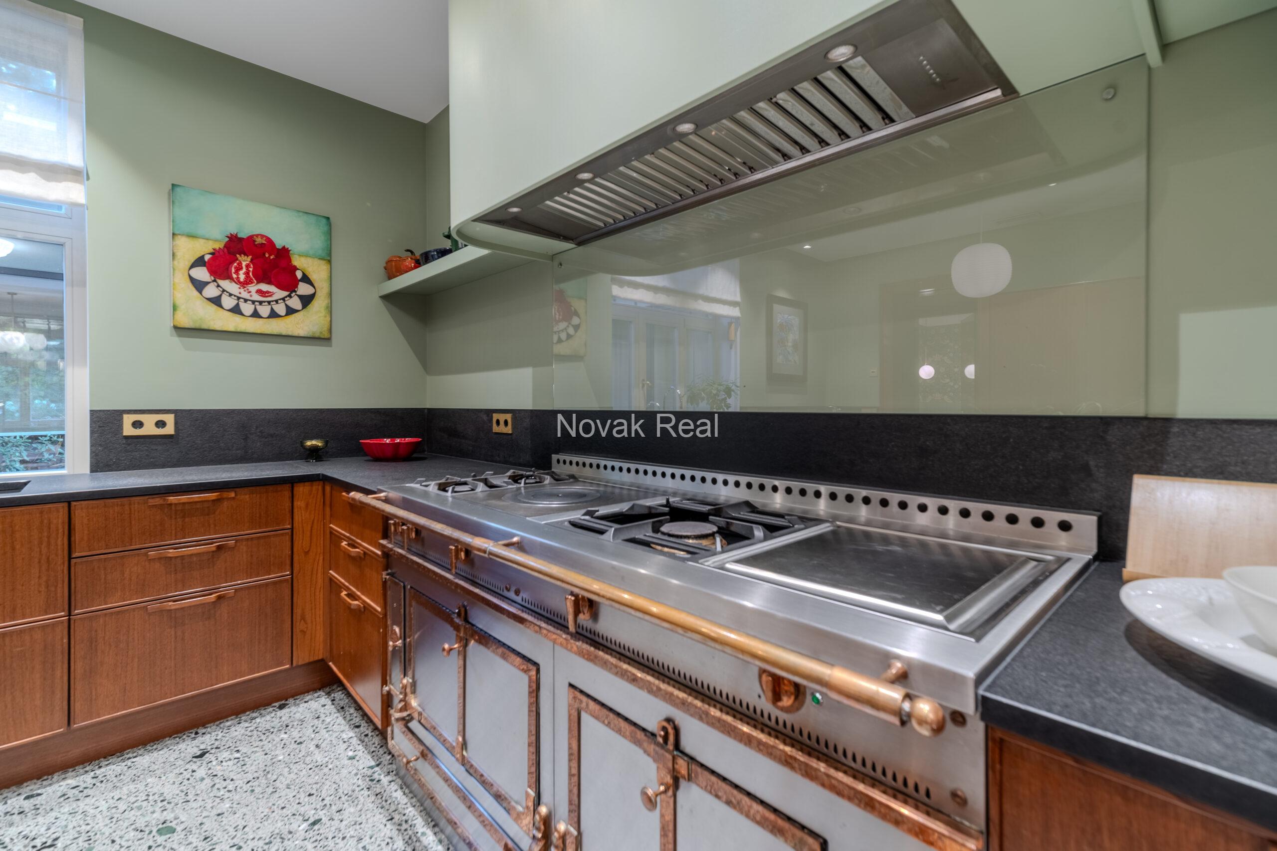 In Lielupe, close to the sea and a pine park, an elegant, renovated three-storey villa is offered for sale
