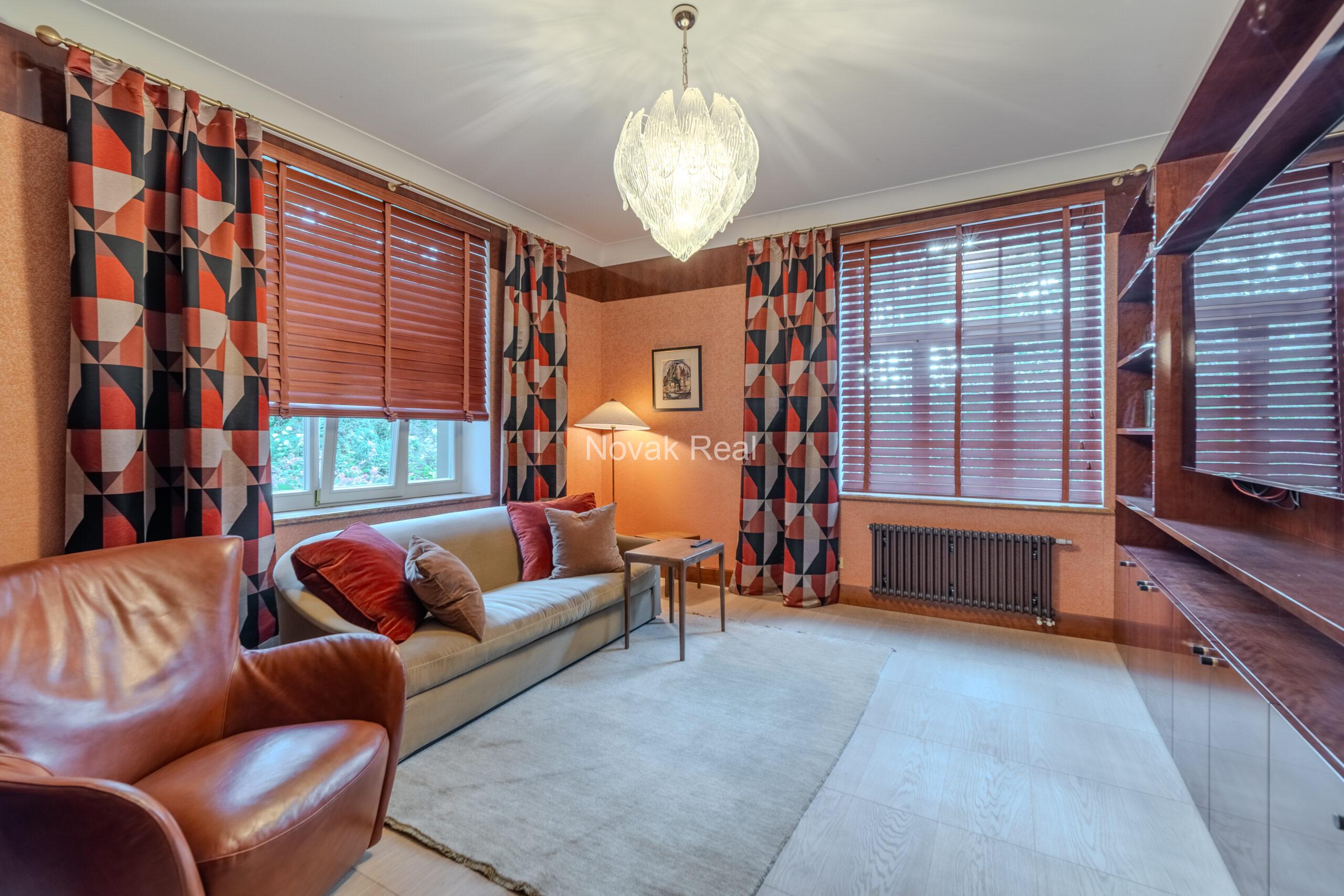In Lielupe, close to the sea and a pine park, an elegant, renovated three-storey villa is offered for sale