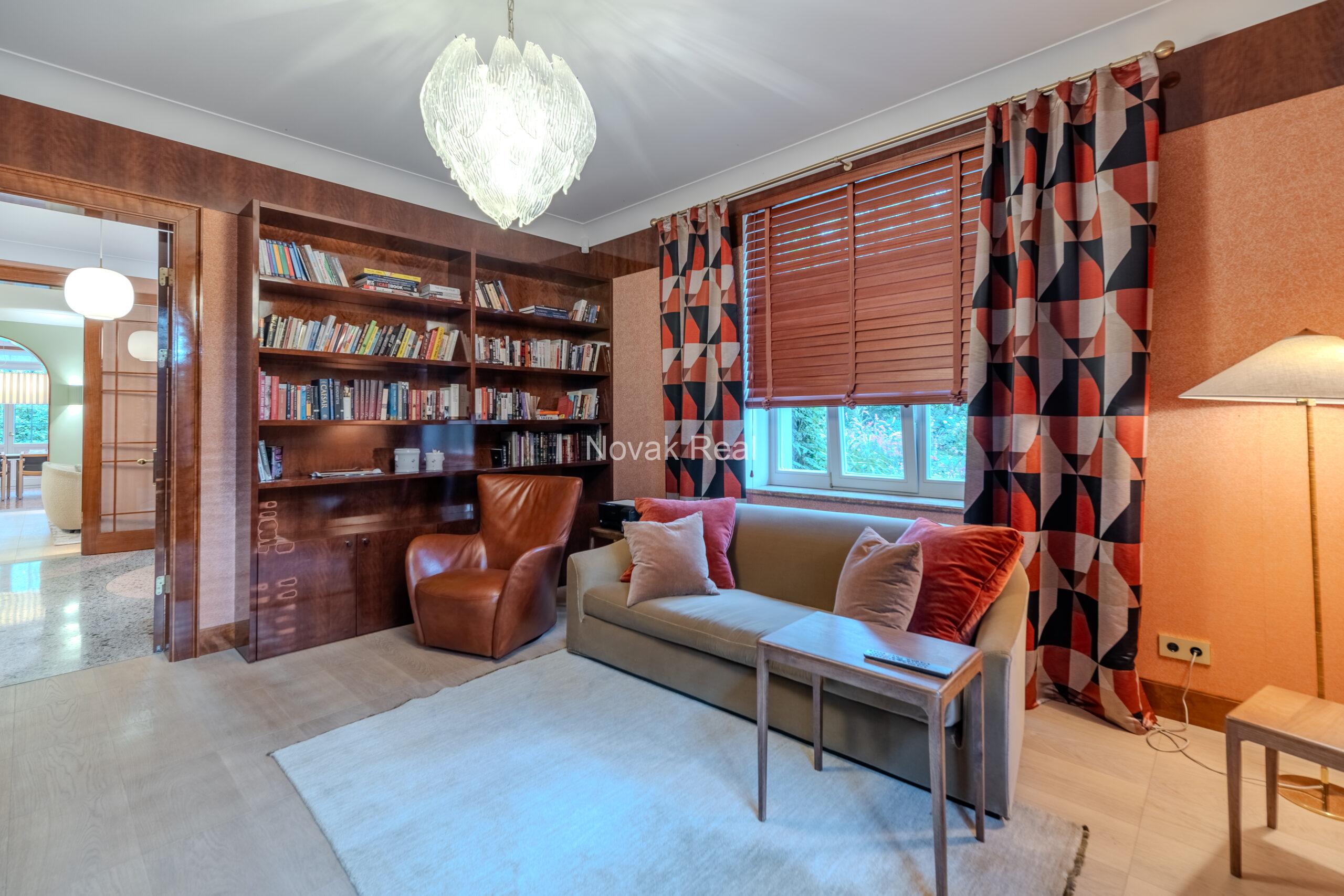 In Lielupe, close to the sea and a pine park, an elegant, renovated three-storey villa is offered for sale