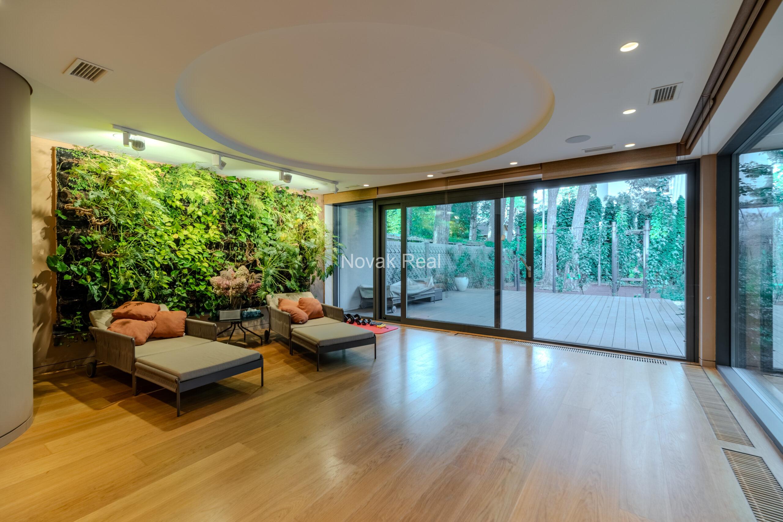 In Lielupe, close to the sea and a pine park, an elegant, renovated three-storey villa is offered for sale