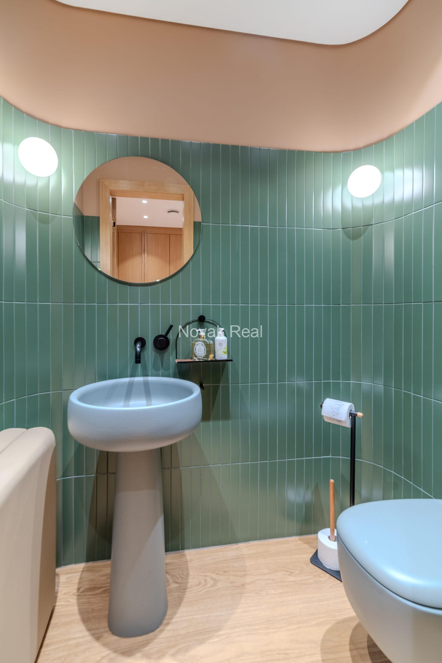 In Lielupe, close to the sea and a pine park, an elegant, renovated three-storey villa is offered for sale