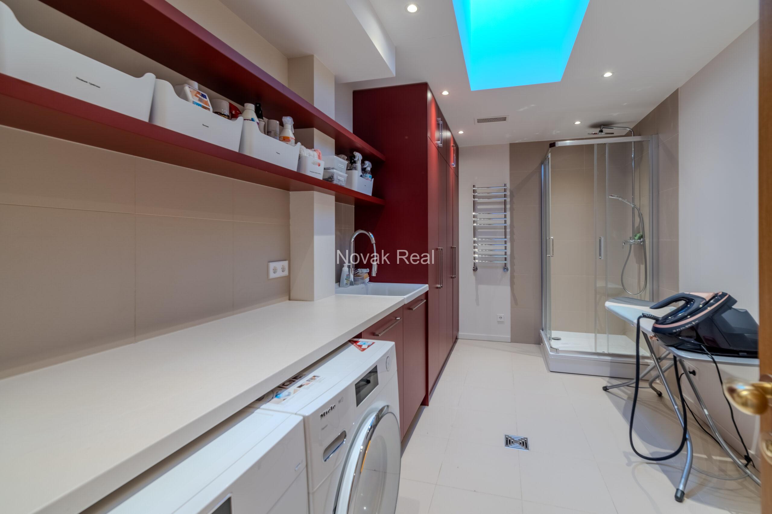 In Lielupe, close to the sea and a pine park, an elegant, renovated three-storey villa is offered for sale