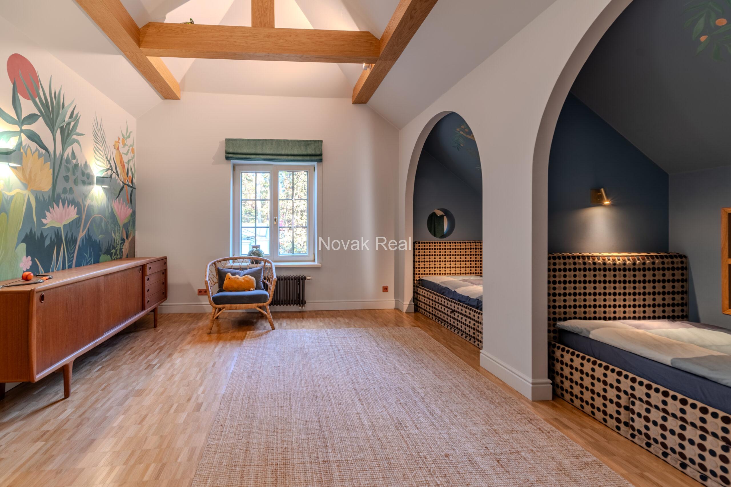 In Lielupe, close to the sea and a pine park, an elegant, renovated three-storey villa is offered for sale