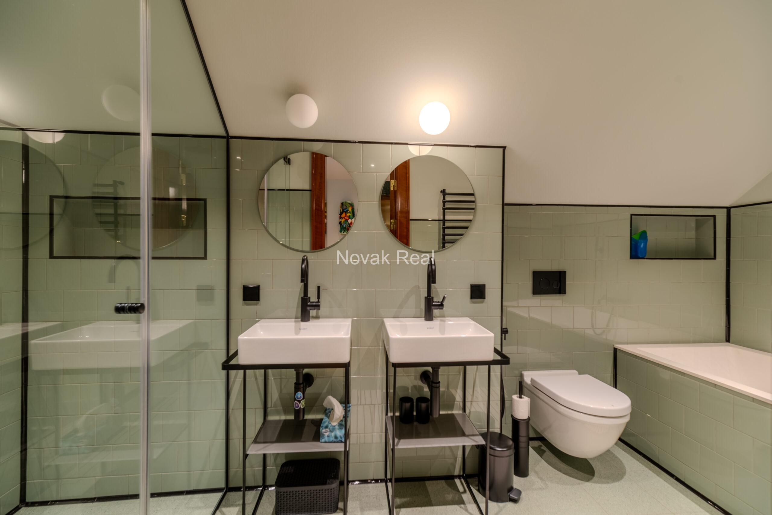 In Lielupe, close to the sea and a pine park, an elegant, renovated three-storey villa is offered for sale