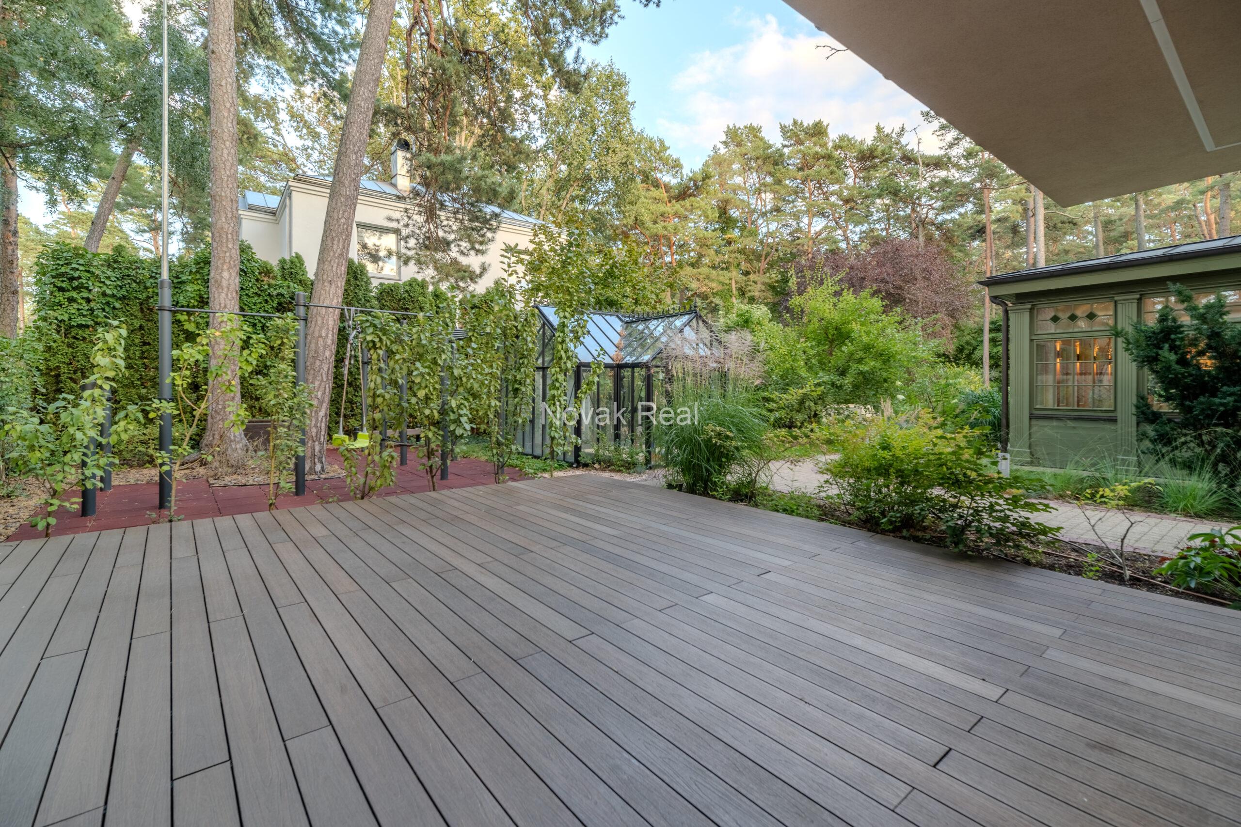 In Lielupe, close to the sea and a pine park, an elegant, renovated three-storey villa is offered for sale