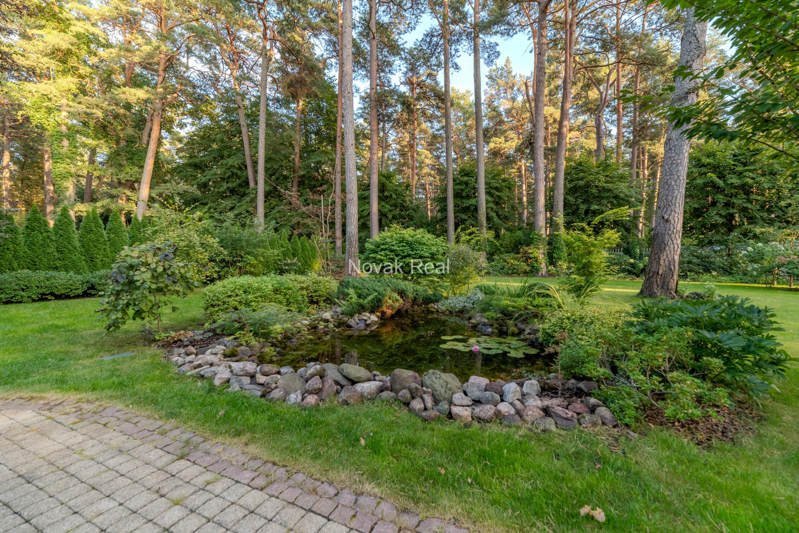 In Lielupe, close to the sea and a pine park, an elegant, renovated three-storey villa is offered for sale